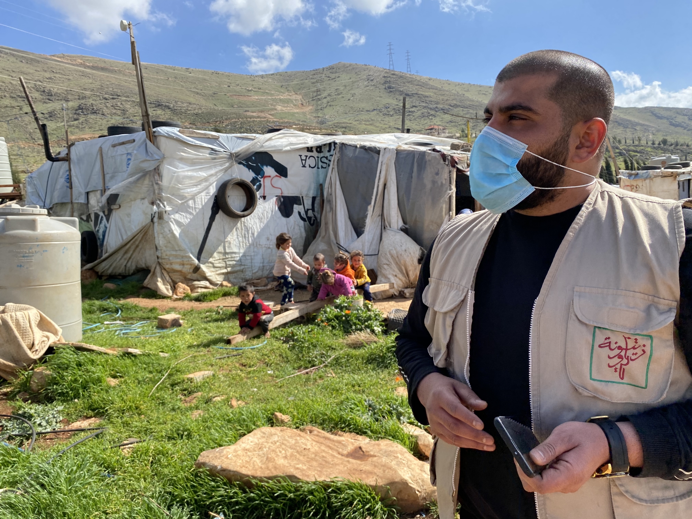 Khaled Abou Haykal, a project manager with Basmeh and Zeitooneh, in an informal refugee camp near the Syrian border. 