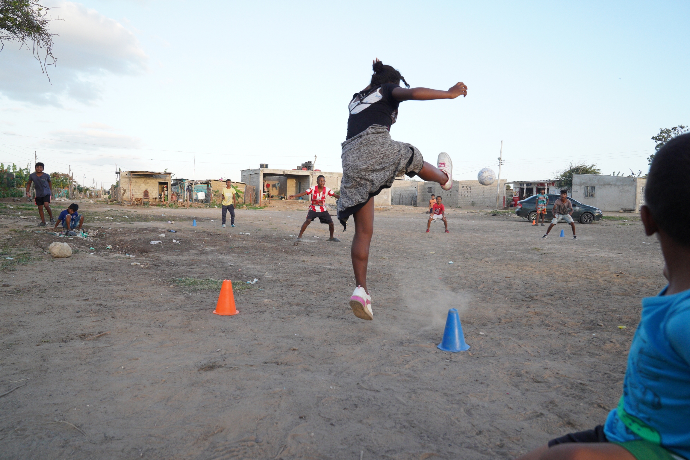 Kickball players in the Villa Isler neighborhood do a warm up drill before a match. The league is open to children and adults. Kickball players in the Villa Isler neighborhood do a warm up drill before a match. The league is open to children and adults.