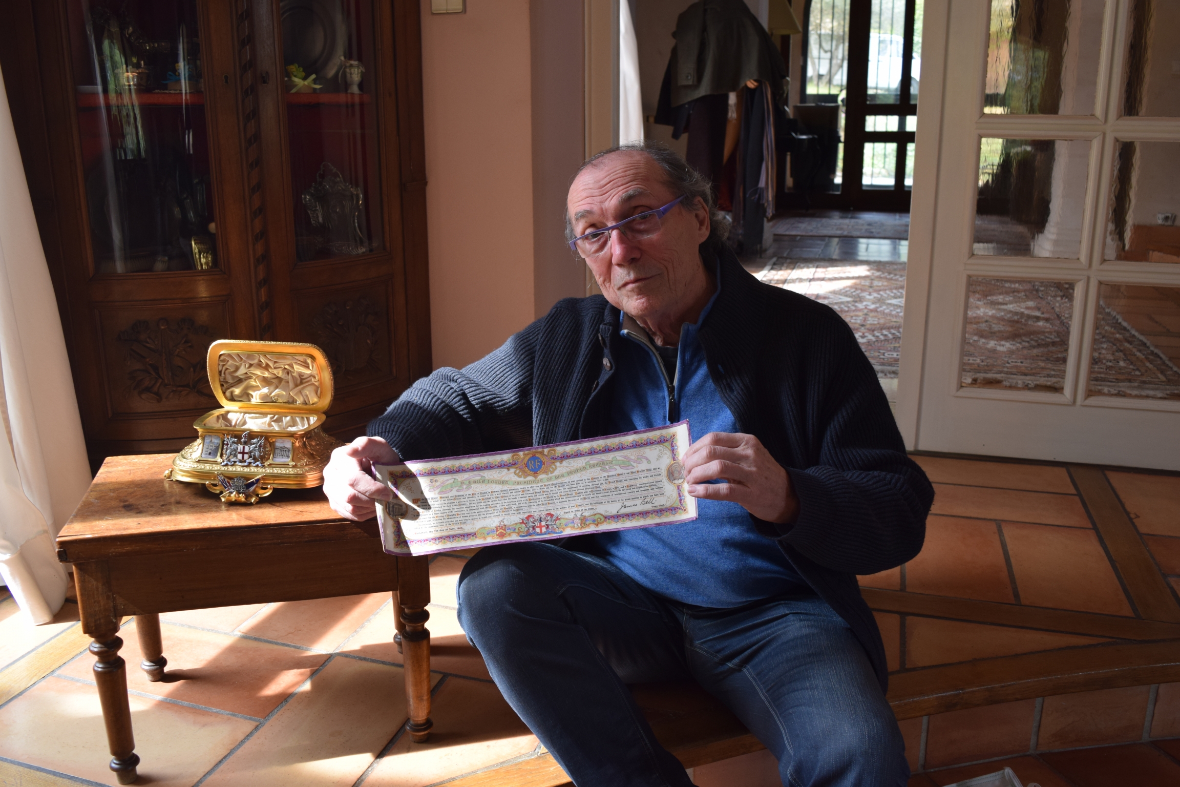 Michel Becker, art collector, sits with the golden chest featured in the "The Golden Treasure of the Entente Cordiale." Michel Becker, art collector, sits with the golden chest featured in the "The Golden Treasure of the Entente Cordiale."