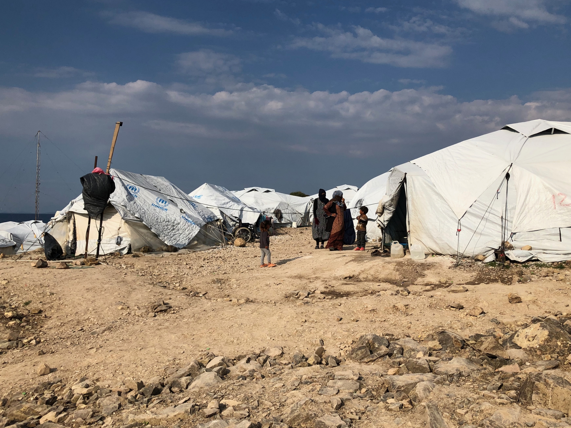 Approximately 7,000 asylum-seekers and refugees live in the temporary Mavrovouni camp on Lesbos. Approximately 7,000 asylum-seekers and refugees live in the temporary Mavrovouni camp on Lesbos.