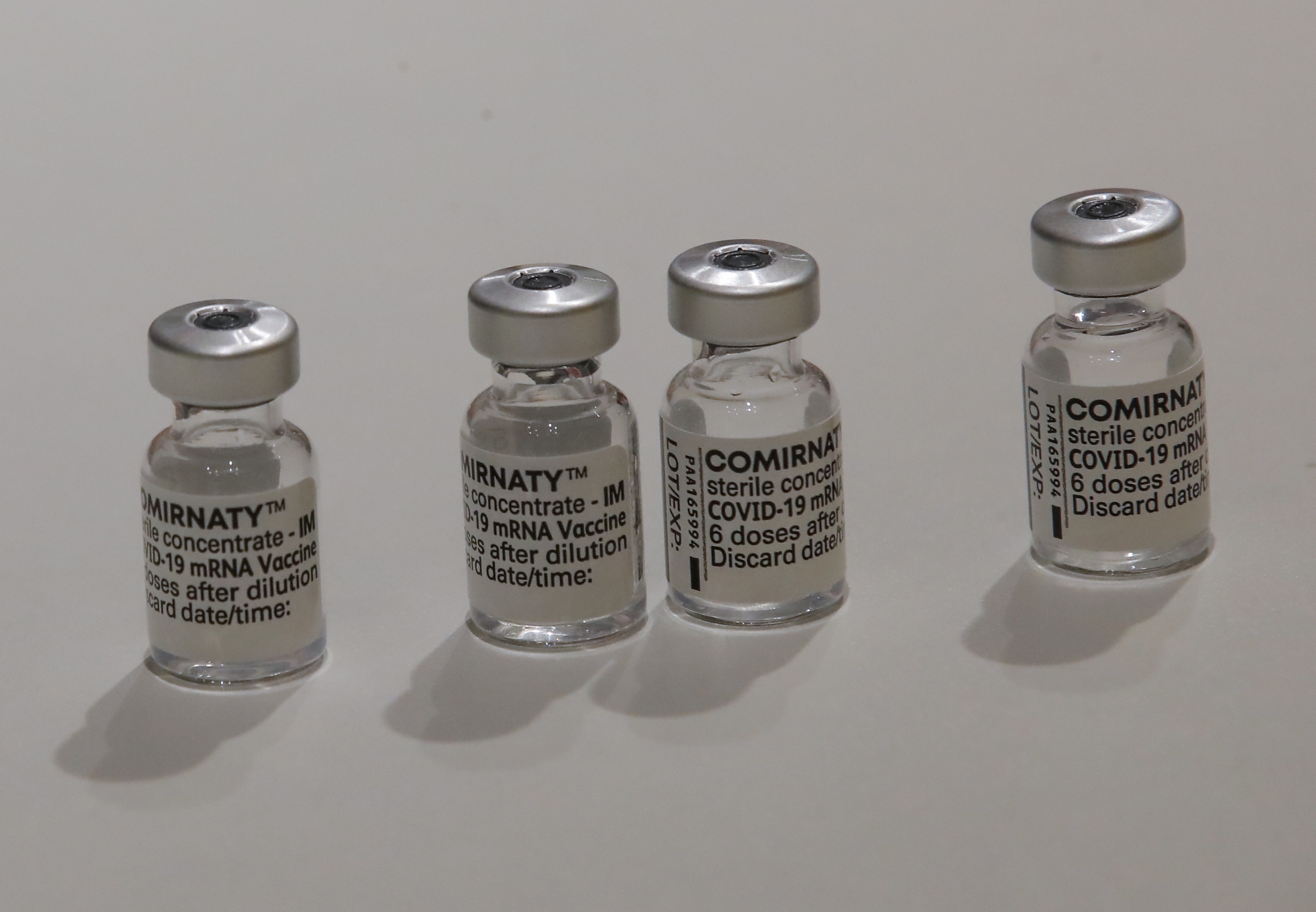 Pfizer COVID-19 vaccine doses are pictured at a new giant vaccination center run by the Paris Fire Brigade, May 6, 2021. Four vials of the COVID-19 vaccine doses