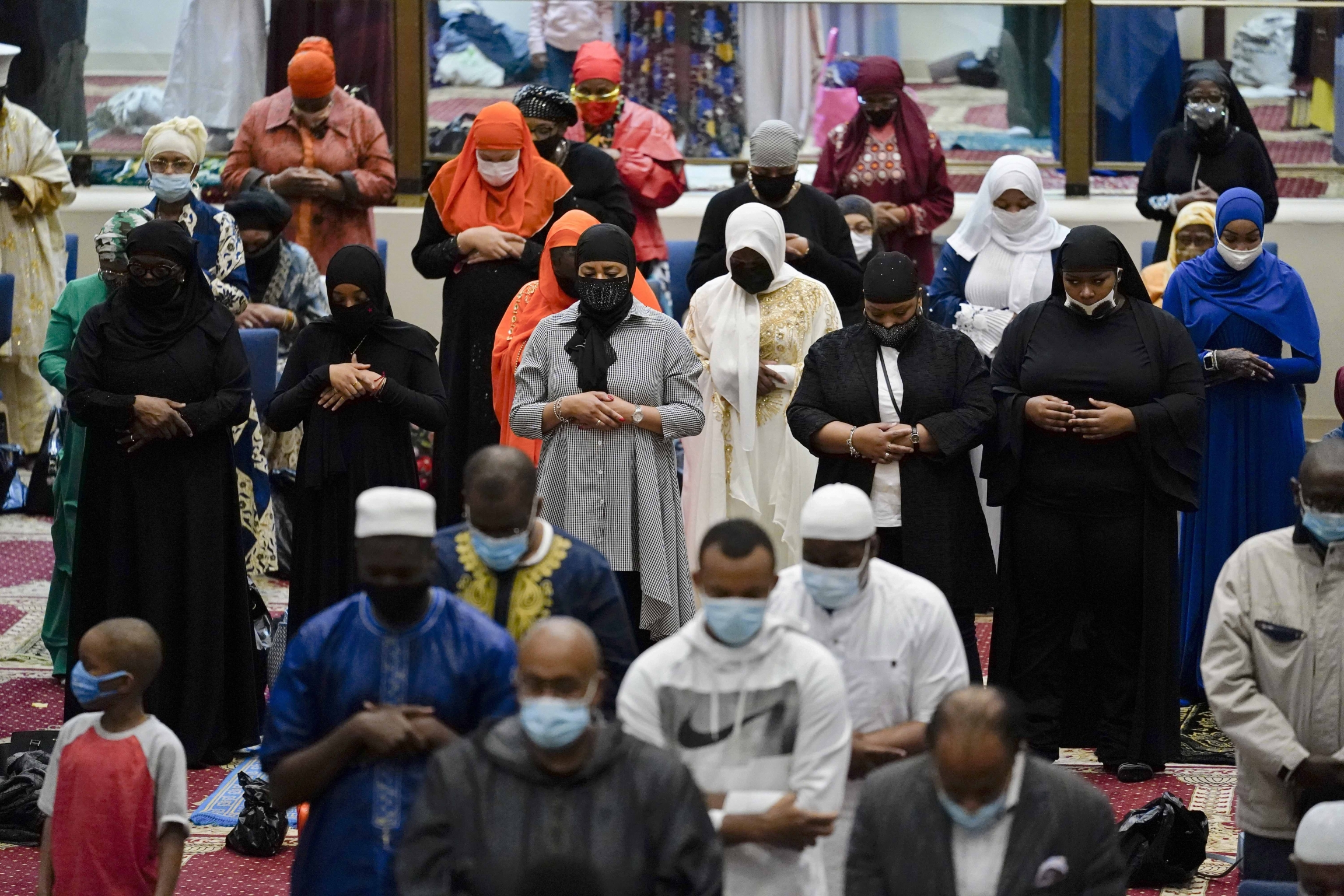 Worshippers perform an Eid al-Fitr prayer at the Masjidullah Mosque in Philadelphia, on Thursday, May 13, 2021 Worshippers perform an Eid al-Fitr prayer at the Masjidullah Mosque in Philadelphia, on Thursday, May 13, 2021