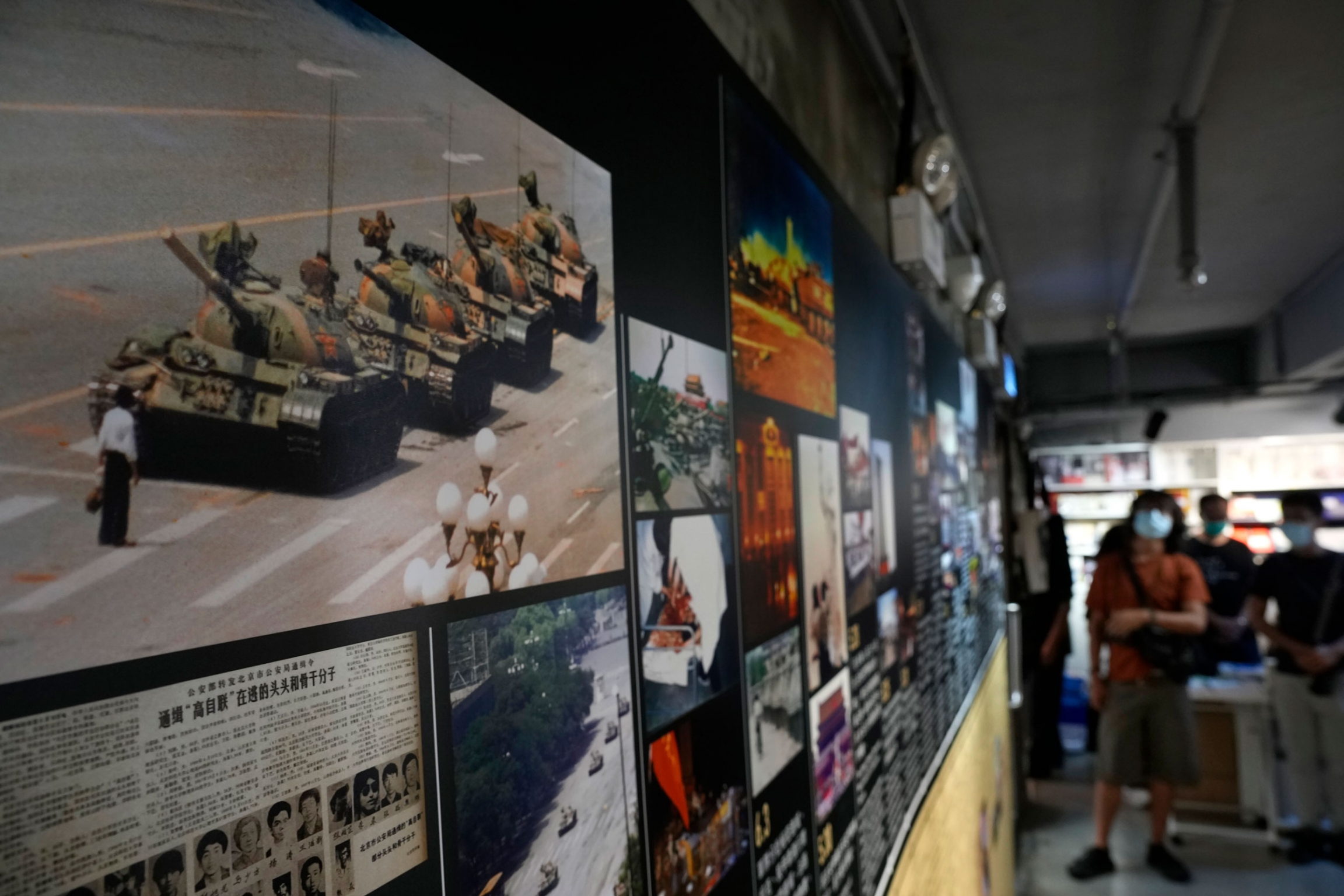 A picture showing a man blocking a line of tanks at the 1989 pro-democracy movement in Beijing is displayed at the "June 4 Memorial Museum." A photograph of a man blocking a line of four tanks in a street is shown hanging with other photographs and newspaper clippings.