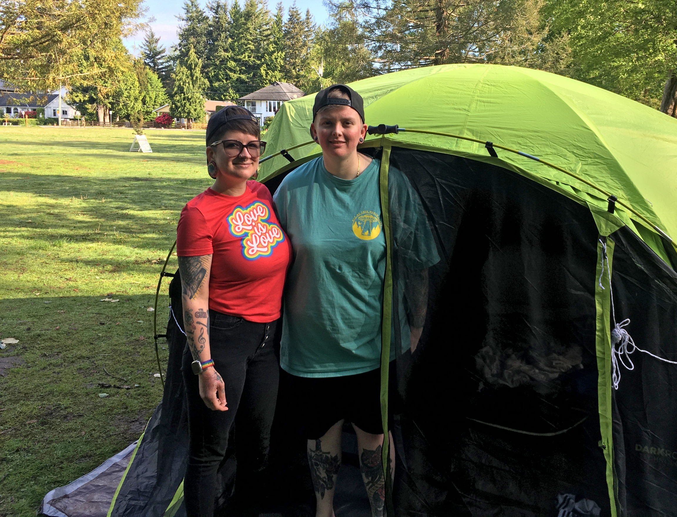 Alexis Gurr (left), of Everett, Washington, and her wife, Katrina Gurr, of Port Moody, British Columbia, pose outside their tent on the US side of Peace Arch Park. Alexis Gurr (left), of Everett, Washington, and her wife, Katrina Gurr, of Port Moody, British Columbia, pose outside their tent on the US side of Peace Arch Park.