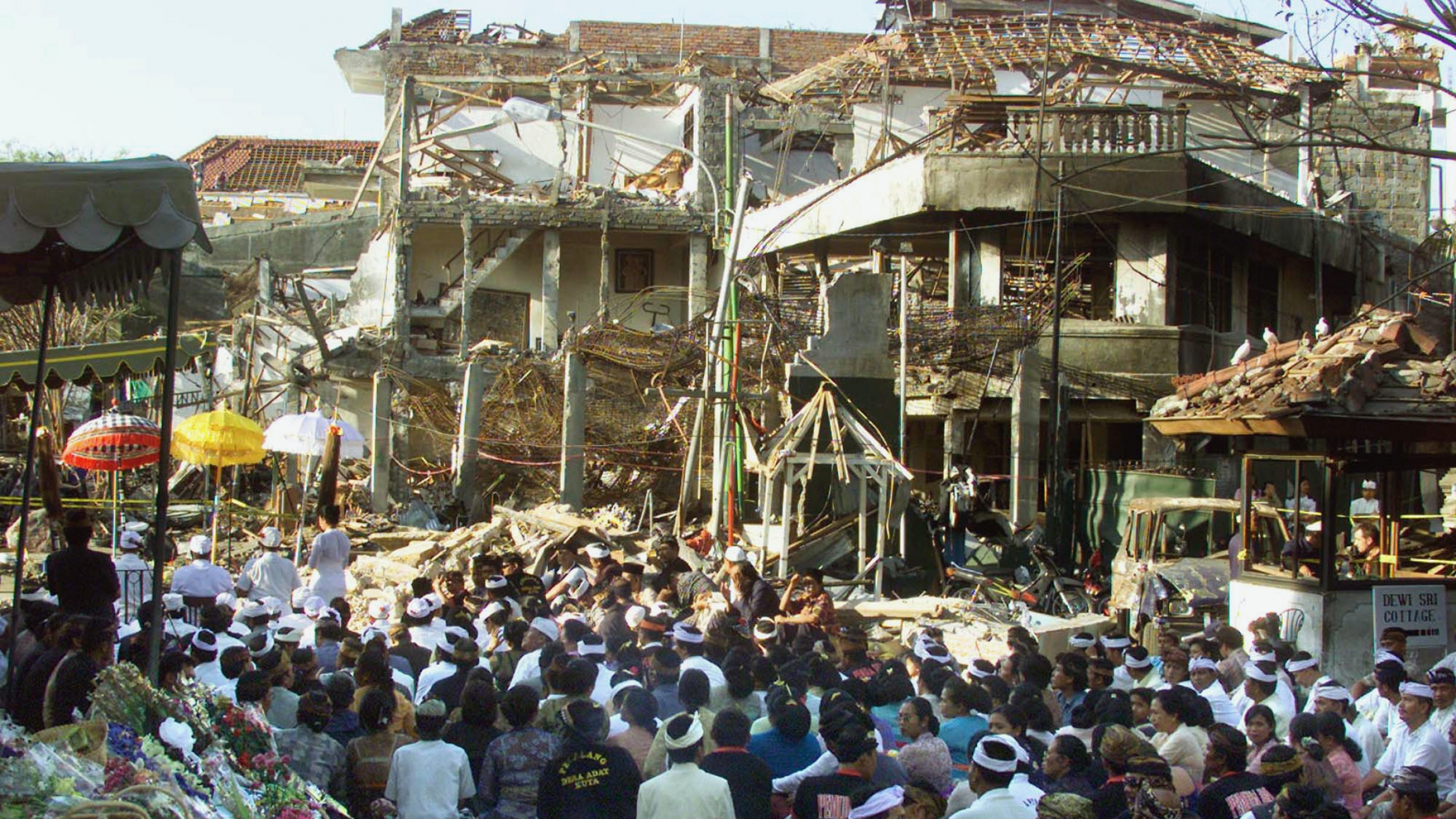 Local Balinese offer prayers for the victims at the site of the bomb blast in Kuta, Bali, Oct. 18, 2002. Nearly 200 people were killed and more than 300 were injured in the nightclub bombing. Local Balinese offer prayers for the victims at the site of the bomb blast in Kuta, Bali, Oct. 18, 2002. Nearly 200 people were killed and more than 300 were injured in the nightclub bombing.