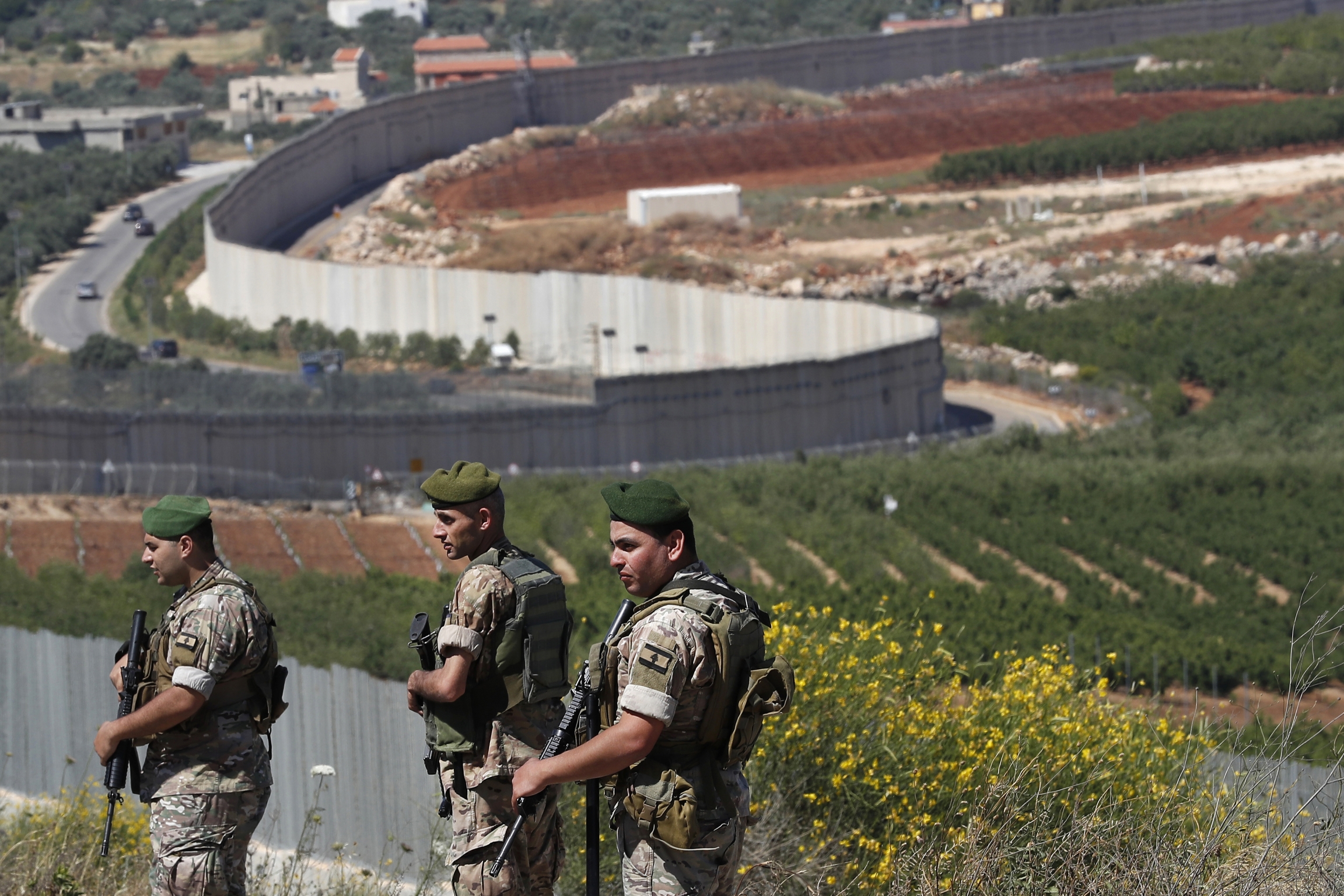 Lebanese army soldiers deploy on Lebanon's side of the Lebanese-Israeli border in the southern village of Kfar Kila Lebanese army soldiers deploy on Lebanon's side of the Lebanese-Israeli border in the southern village of Kfar Kila