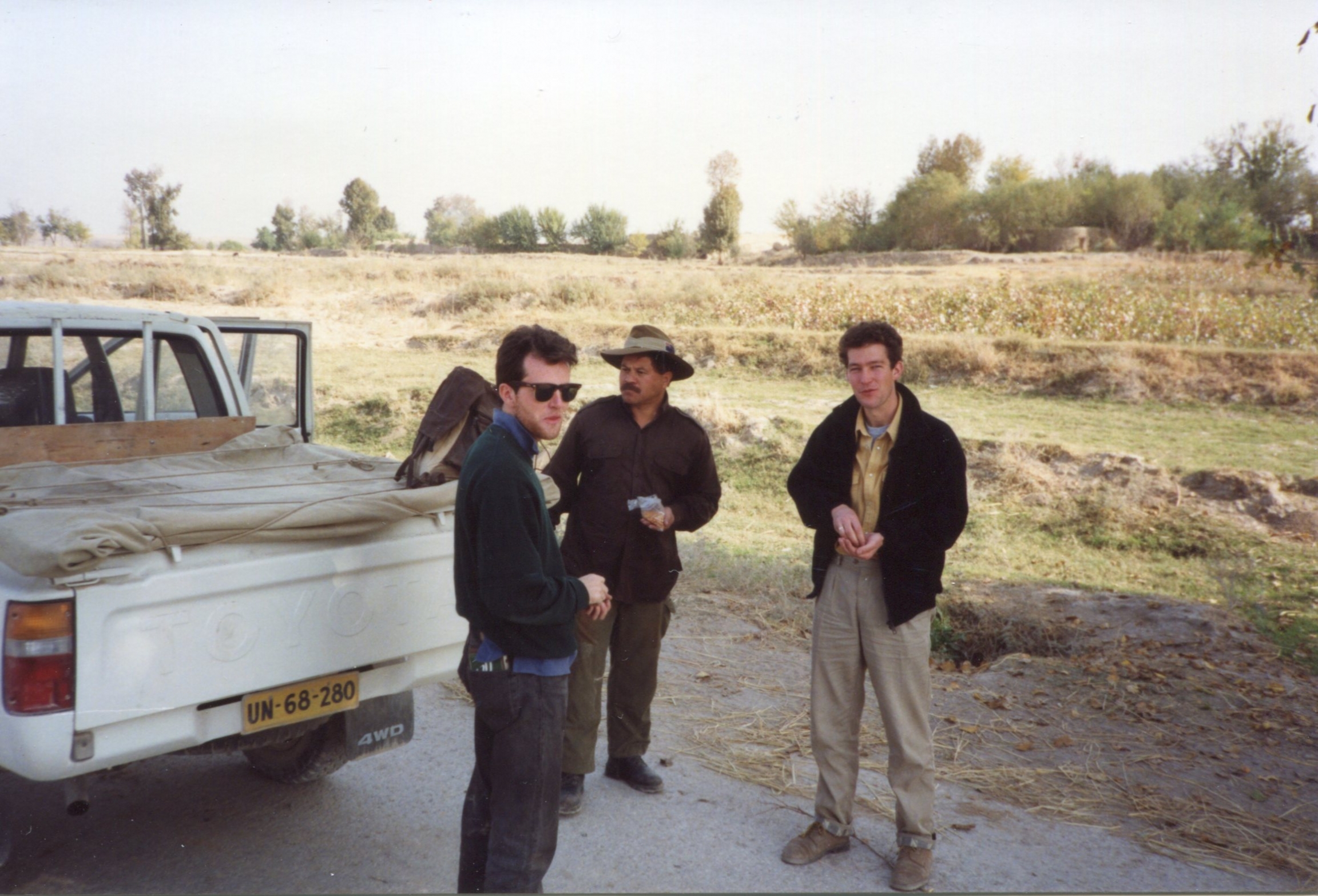 A pit stop in Baghlan Province, Afganistan, 1991. The BBC’s Chris Bowers (right), with officials from The HALO Trust and the UN. A pit stop in Baghlan Province, Afganistan, 1991. The BBC’s Chris Bowers (right), with officials from The HALO Trust and the UN.