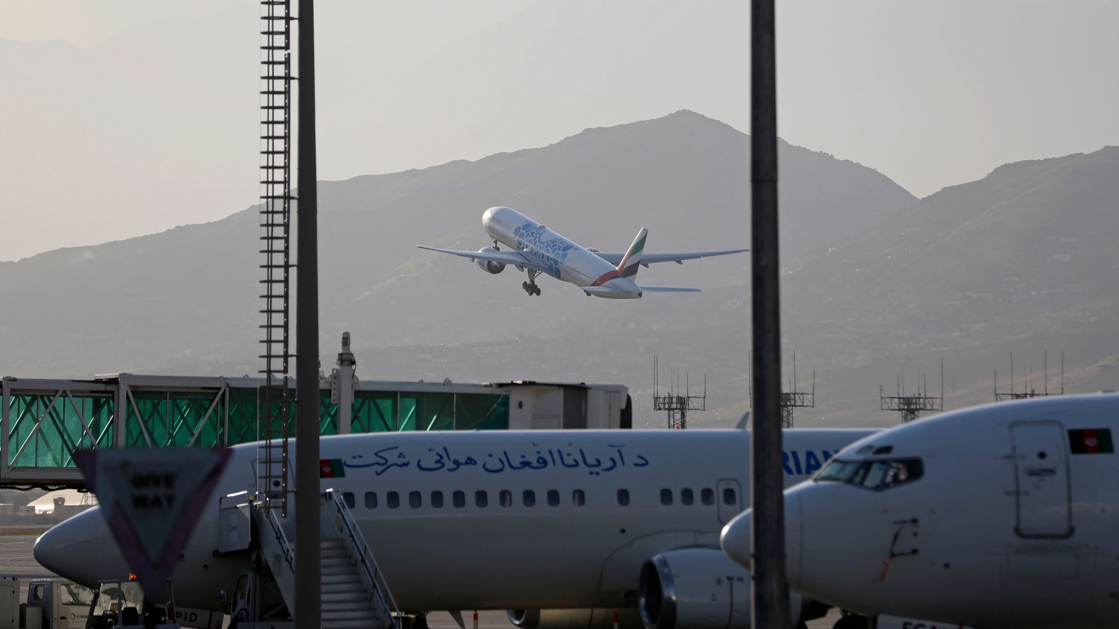 A plane takes off from Hamid Karzai International Airport in Kabul, Afghanistan, Sunday, July 4, 2021. A plane takes off from Hamid Karzai International Airport in Kabul, Afghanistan, Sunday, July 4, 2021.