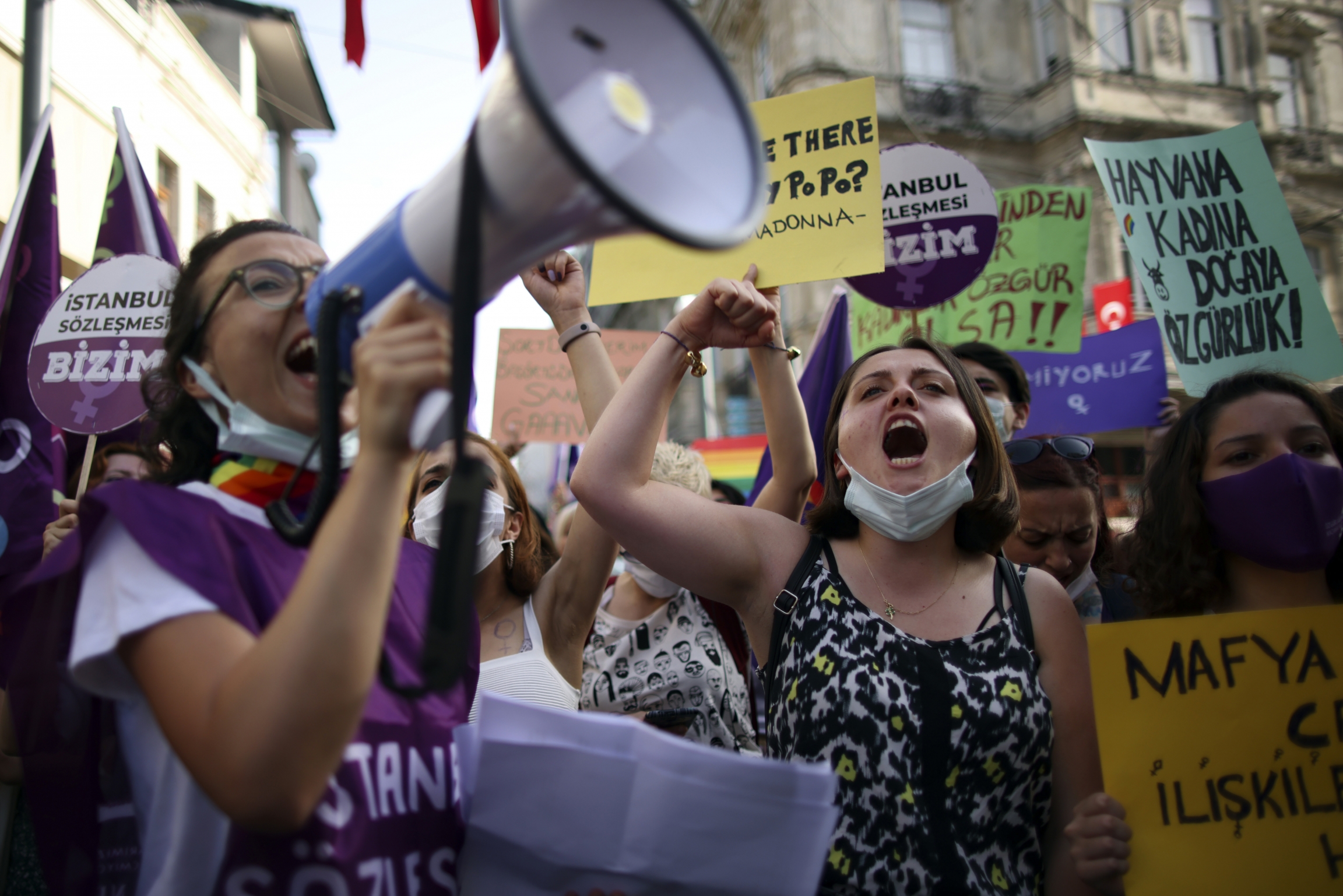 People chant slogans during a protest against the government's decision to withdraw from Istanbul Convention, in Istanbul, Thursday, July 1, 2021. People chant slogans during a protest against the government's decision to withdraw from Istanbul Convention, in Istanbul, Thursday, July 1, 2021.