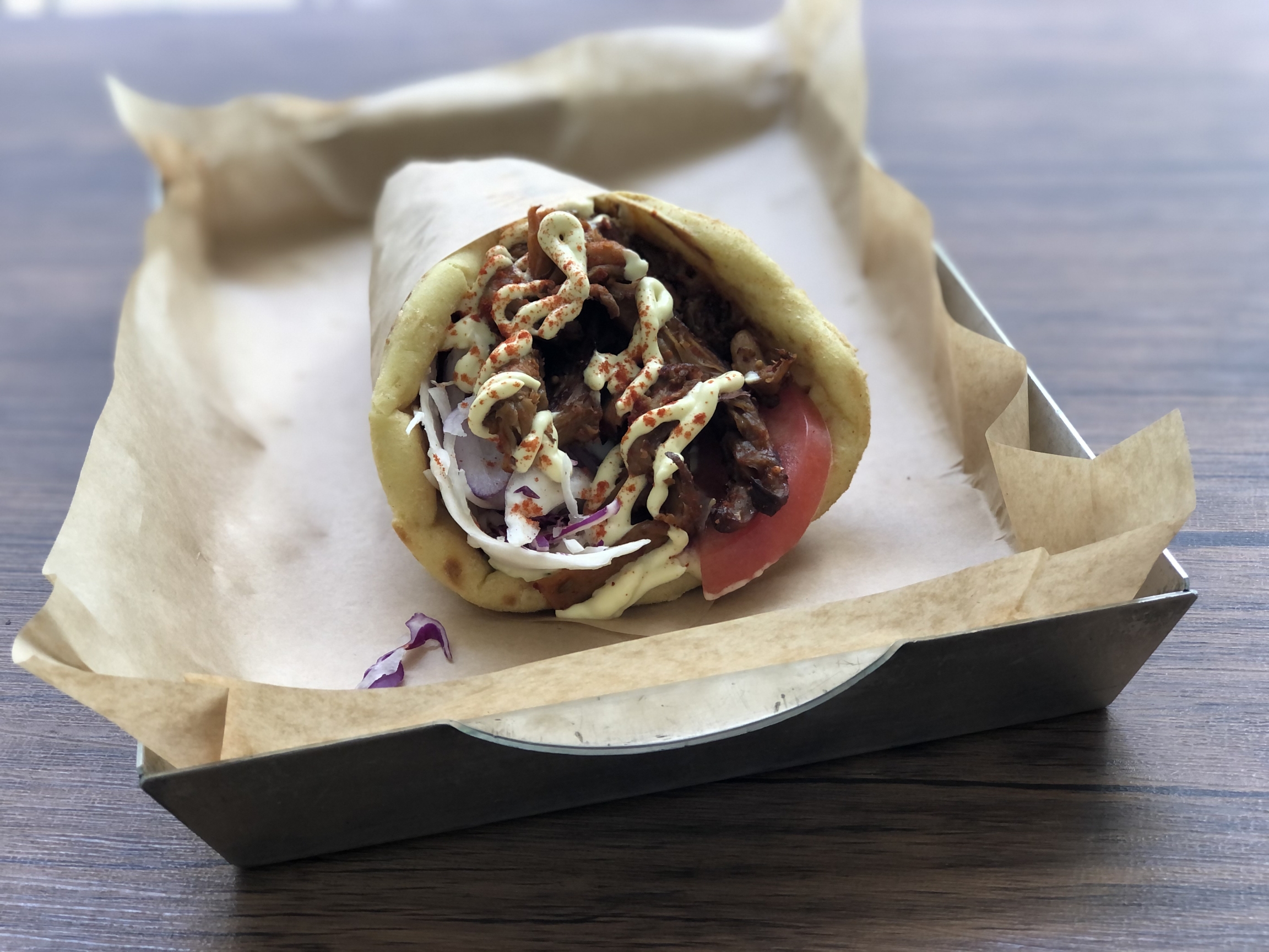 Vegan Beat’s gyro is stuffed with thinly sliced baked mushrooms, tomato, onion and vegan tzatziki sauce and mayonnaise. Vegan Beat’s gyro is stuffed with thinly sliced baked mushrooms, tomato, onion and vegan tzatziki sauce and mayonnaise.