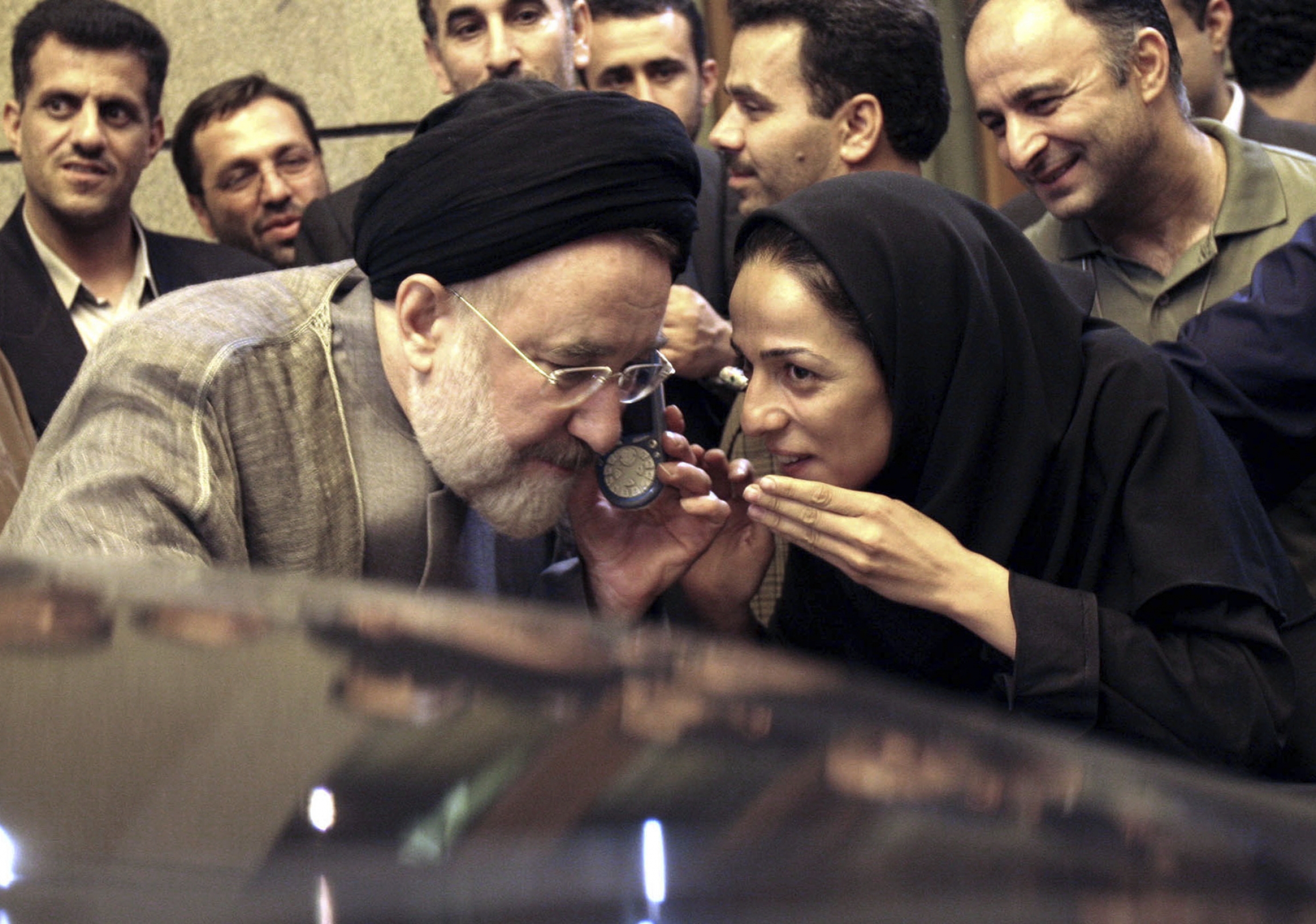 Outgoing reformist Iranian President Mohammad Khatami talks on the phone with the mother of female journalist Masih Alinejad, right, after meeting with journalists in Tehran, Iran, July 13, 2005. Outgoing reformist Iranian President Mohammad Khatami talks on the phone with the mother of female journalist Masih Alinejad, right, after meeting with journalists in Tehran, Iran, July 13, 2005.
