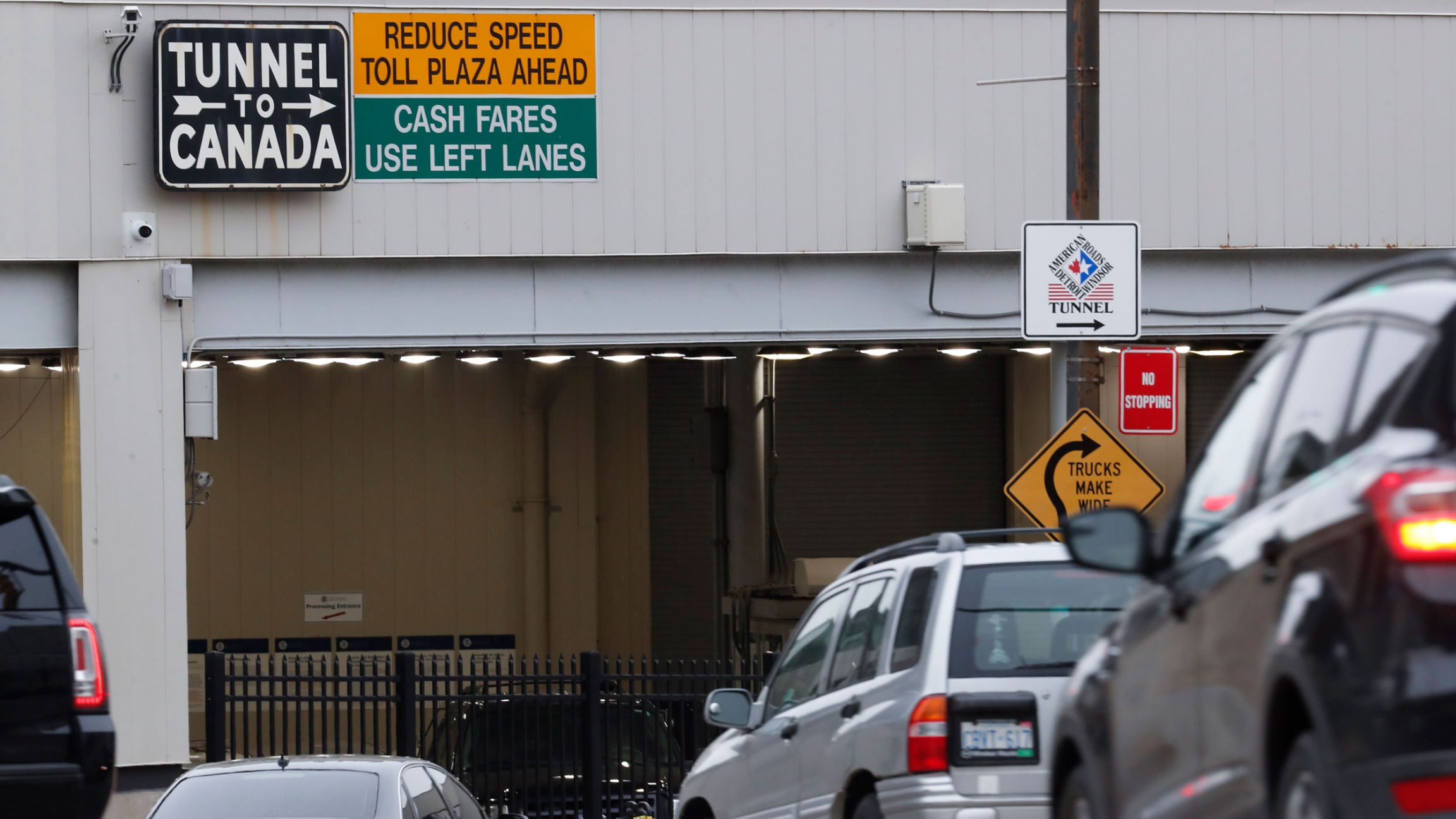 In this March 16, 2020, file photo, vehicles enter the Detroit-Windsor Tunnel in Detroit to travel to Canada. In this March 16, 2020, file photo, vehicles enter the Detroit-Windsor Tunnel in Detroit to travel to Canada.