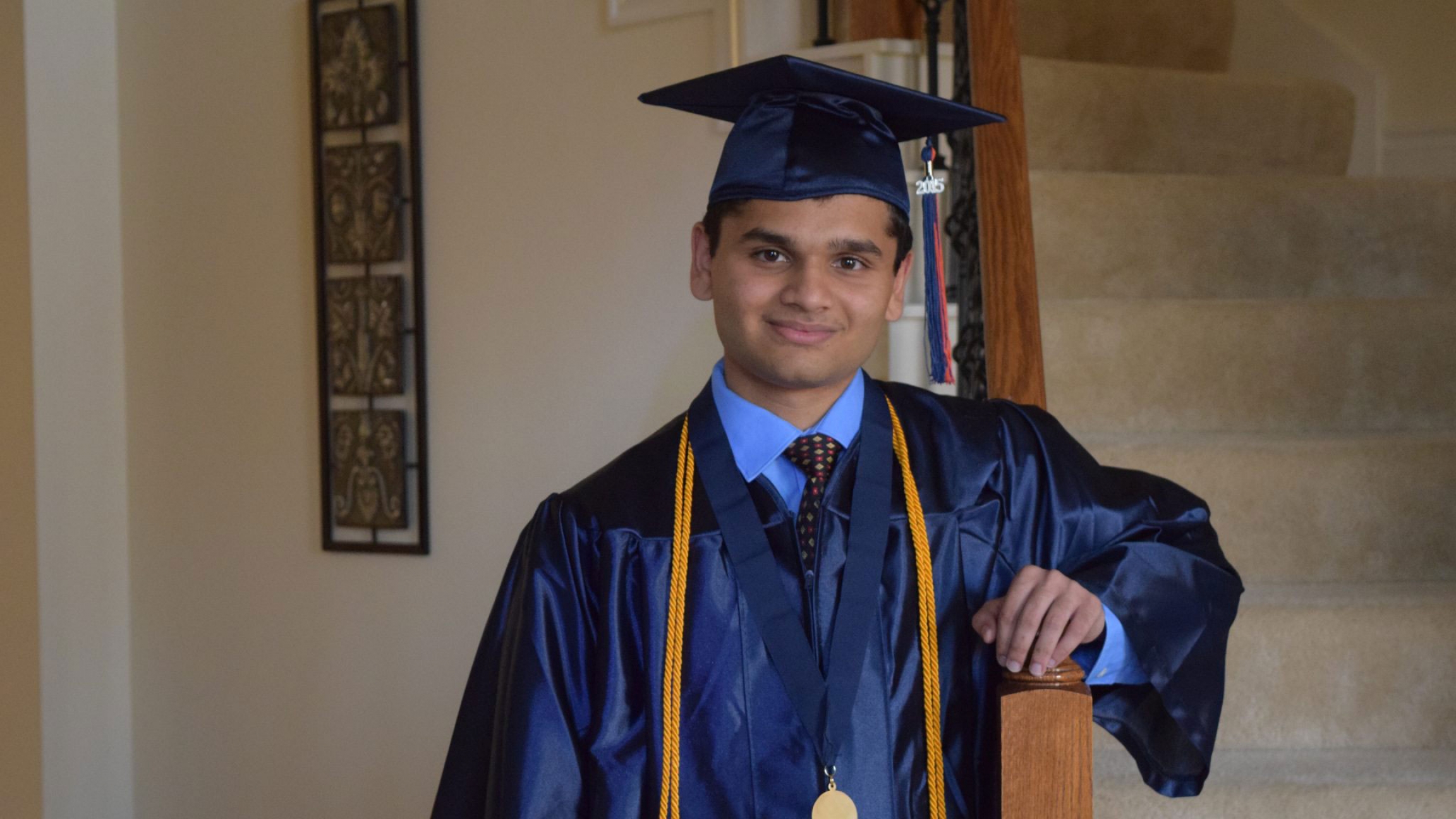 Animesh Namjoshi poses for a graduation photo after receiving his diploma at Seven Lakes High School in Katy, Texas Animesh Namjoshi poses for a graduation photo after receiving his diploma at Seven Lakes High School