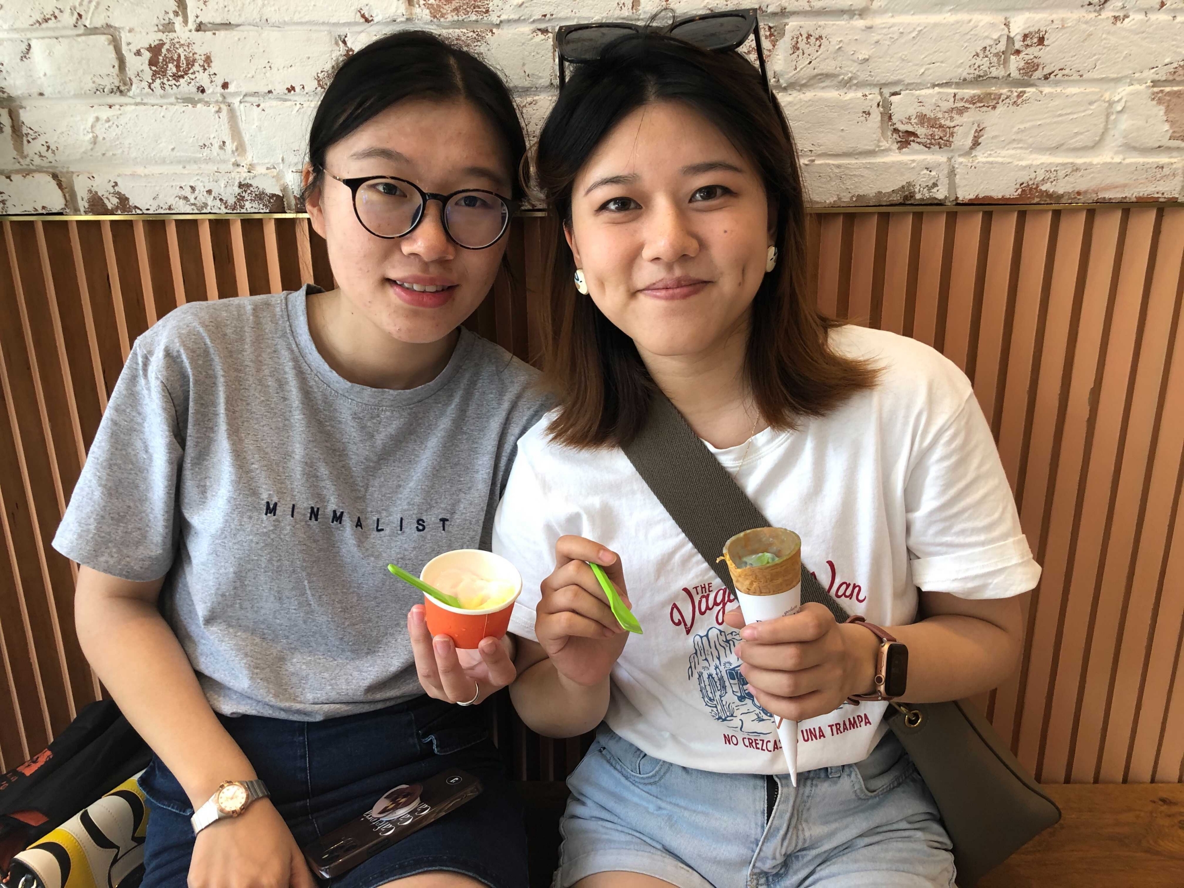 China experiments with ice cream flavors Two women smile for the camera while holding ice cream