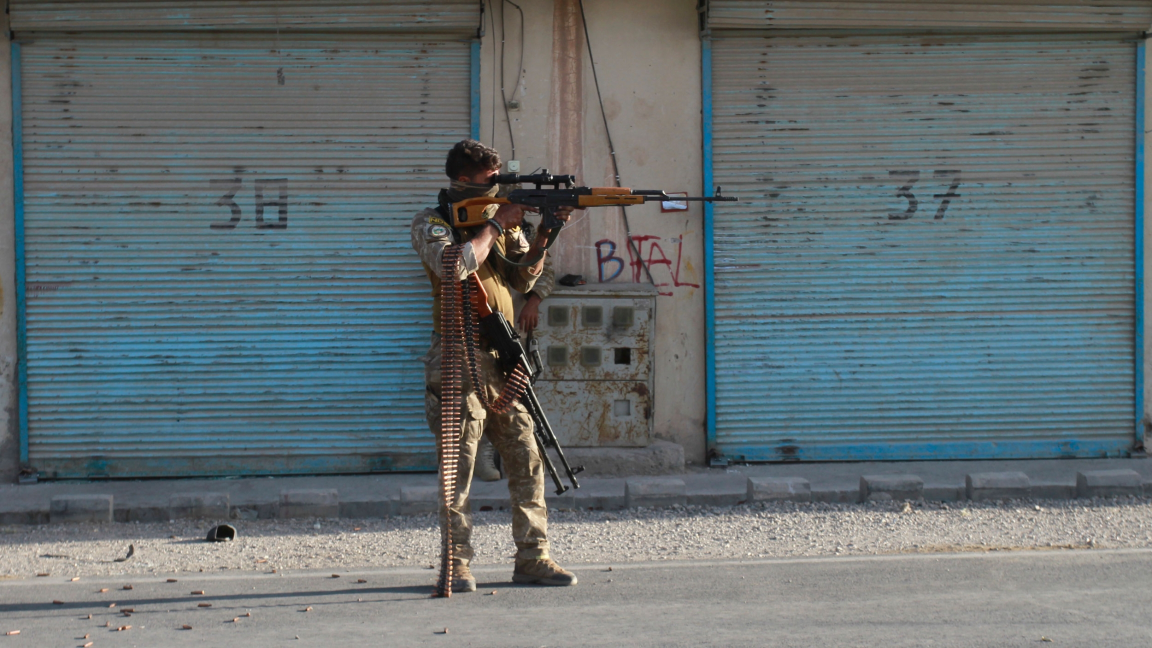 An Afghan security personnel takes a position during fighting between Taliban and Afghan security forces in Herat province, west of Kabul, Afghanistan An Afghan security personnel takes a position during fighting between Taliban and Afghan security forces in Herat province, west of Kabul, Afghanistan