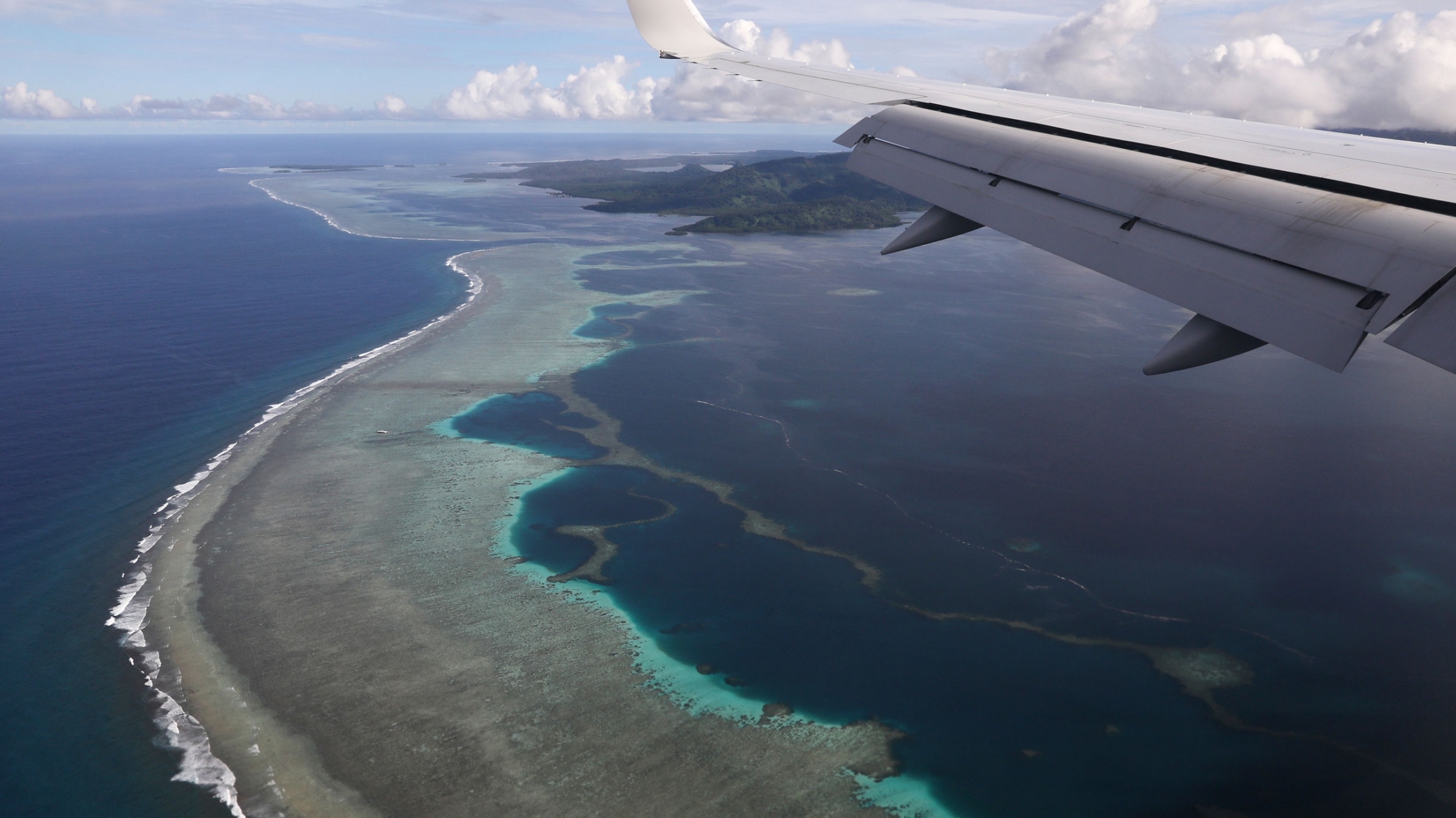 Former US Secretary of State Mike Pompeo's plane makes its landing approach on Pohnpei International Airport in Kolonia, Federated States of Micronesia, Monday, Aug. 5, 2019. Former US Secretary of State Mike Pompeo's plane makes its landing approach on Pohnpei International Airport in Kolonia, Federated States of Micronesia, Monday, Aug. 5, 2019.