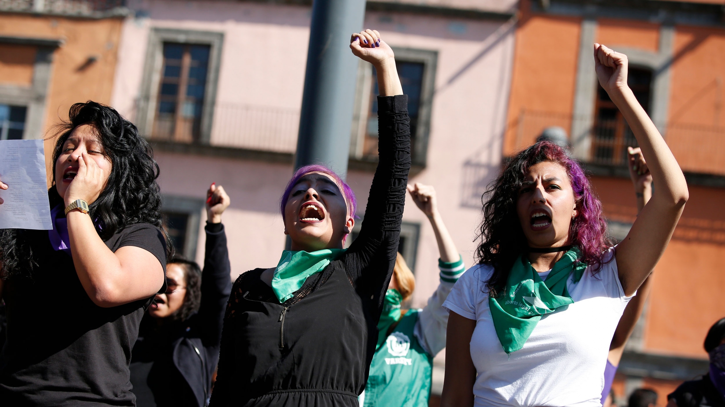 Perla Rosales, 26, center, and Marian Lira, 24, right, participate in a performance in support of abortion rights next to the cathedral in Mexico City, Sunday, Jan. 5, 2020. Perla Rosales, 26, center, and Marian Lira, 24, right, participate in a performance in support of abortion rights next to the cathedral in Mexico City, Sunday, Jan. 5, 2020.