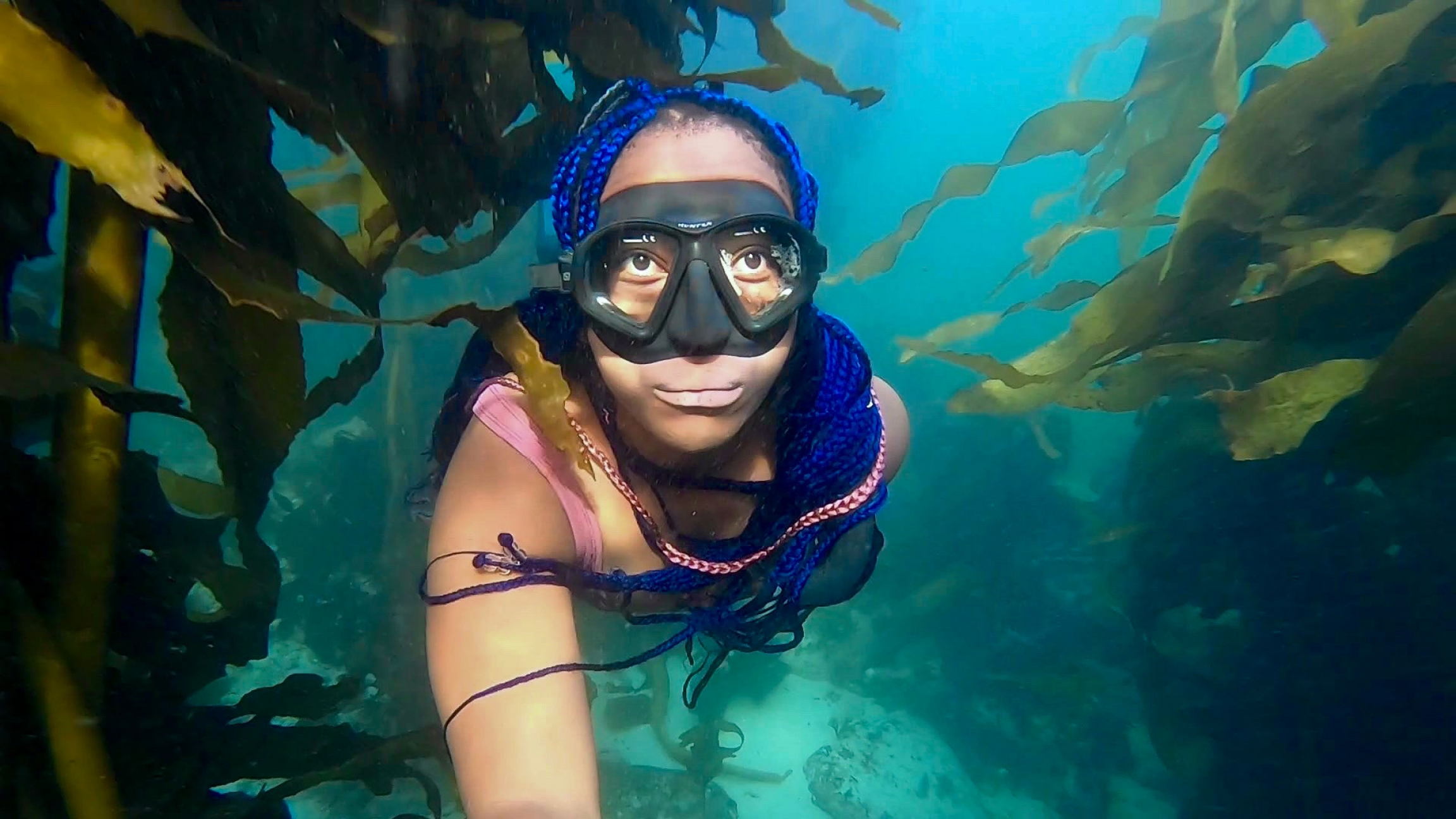 South Africa's "Black Mermaid," Zandile Ndhlovu, enjoys sunrise dives in the kelp forest. South Africa's "Black Mermaid," Zandile Ndhlovu, enjoys sunrise dives in the kelp forest.