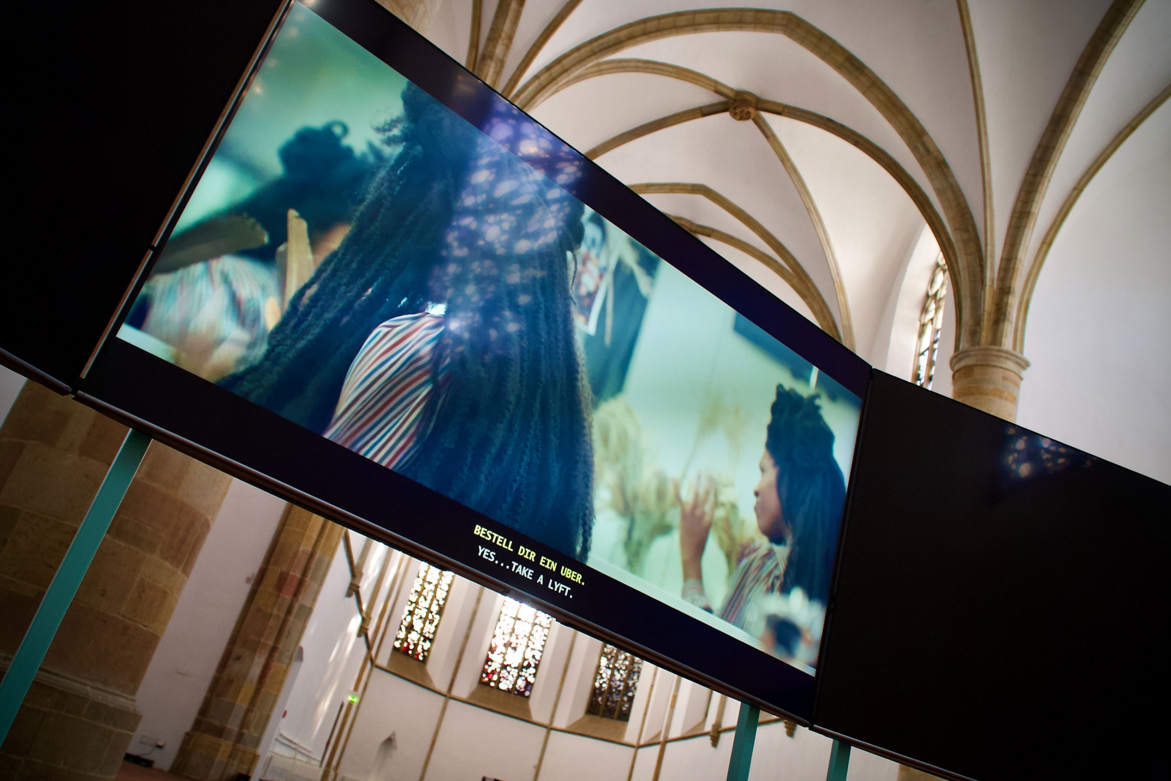 A video installation appears in the the exhibit, "I Felt People Dancing," by Alison O'Daniel. A video installation appears in the the exhibit, "I Felt People Dancing," by Alison O'Daniel.