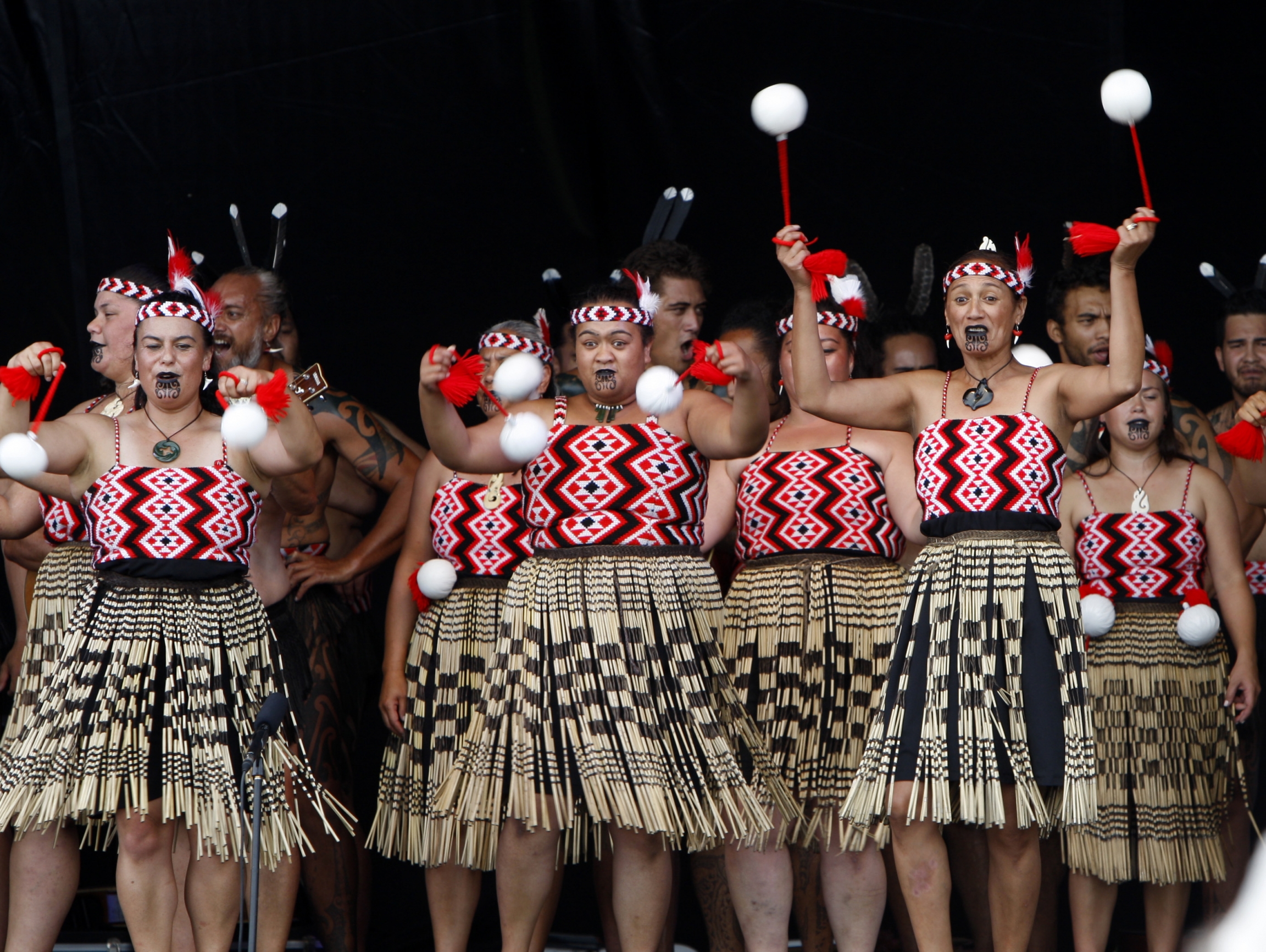 In this Feb. 6, 2015 photo, dancers twirl white "poi" balls as part of an indigenous Maori performance, in Waitangi, New Zealand, to mark the 175th anniversary of the signing of the country's founding document, the Treaty of Waitangi. In this Feb. 6, 2015 photo, dancers twirl white "poi" balls as part of an indigenous Maori performance, in Waitangi, New Zealand, to mark the 175th anniversary of the signing of the country's founding document, the Treaty of Waitangi.