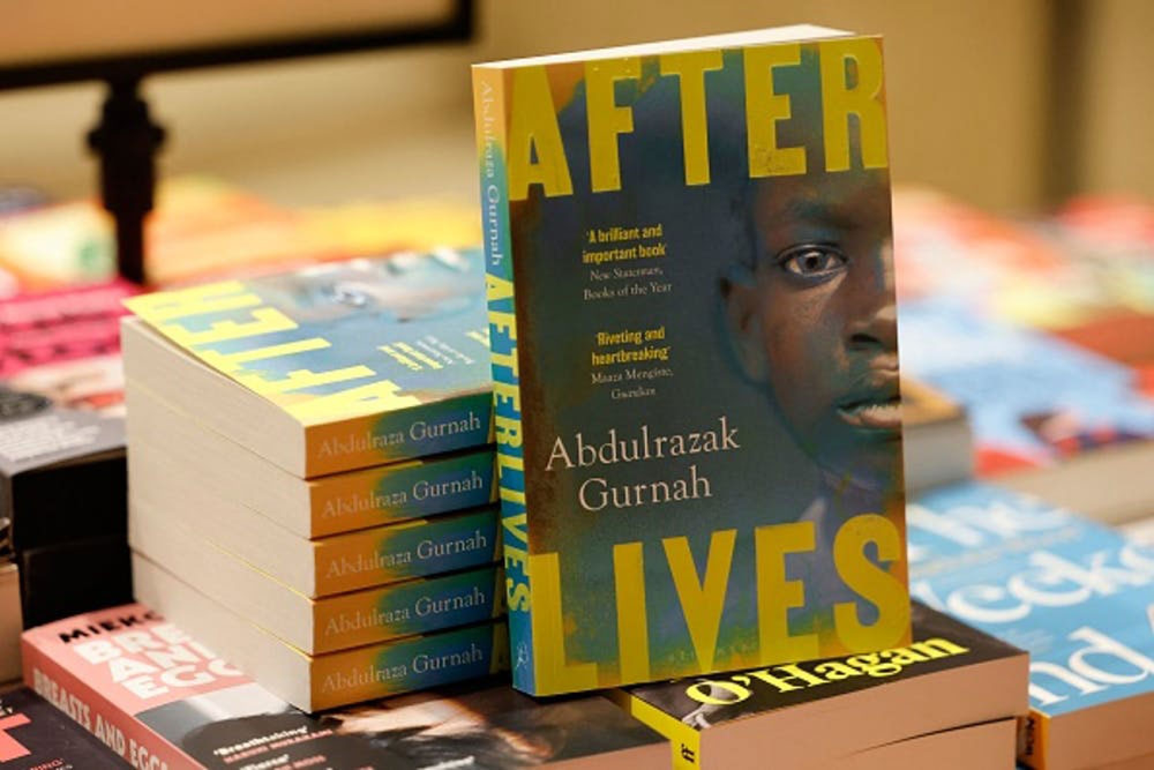 Copies of "Afterlives," by novelist Abdulrazak Gurnah, who grew up in Zanzibar, in East Africa. Copies of "Afterlives," by novelist Abdulrazak Gurnah, who grew up in Zanzibar, in East Africa.