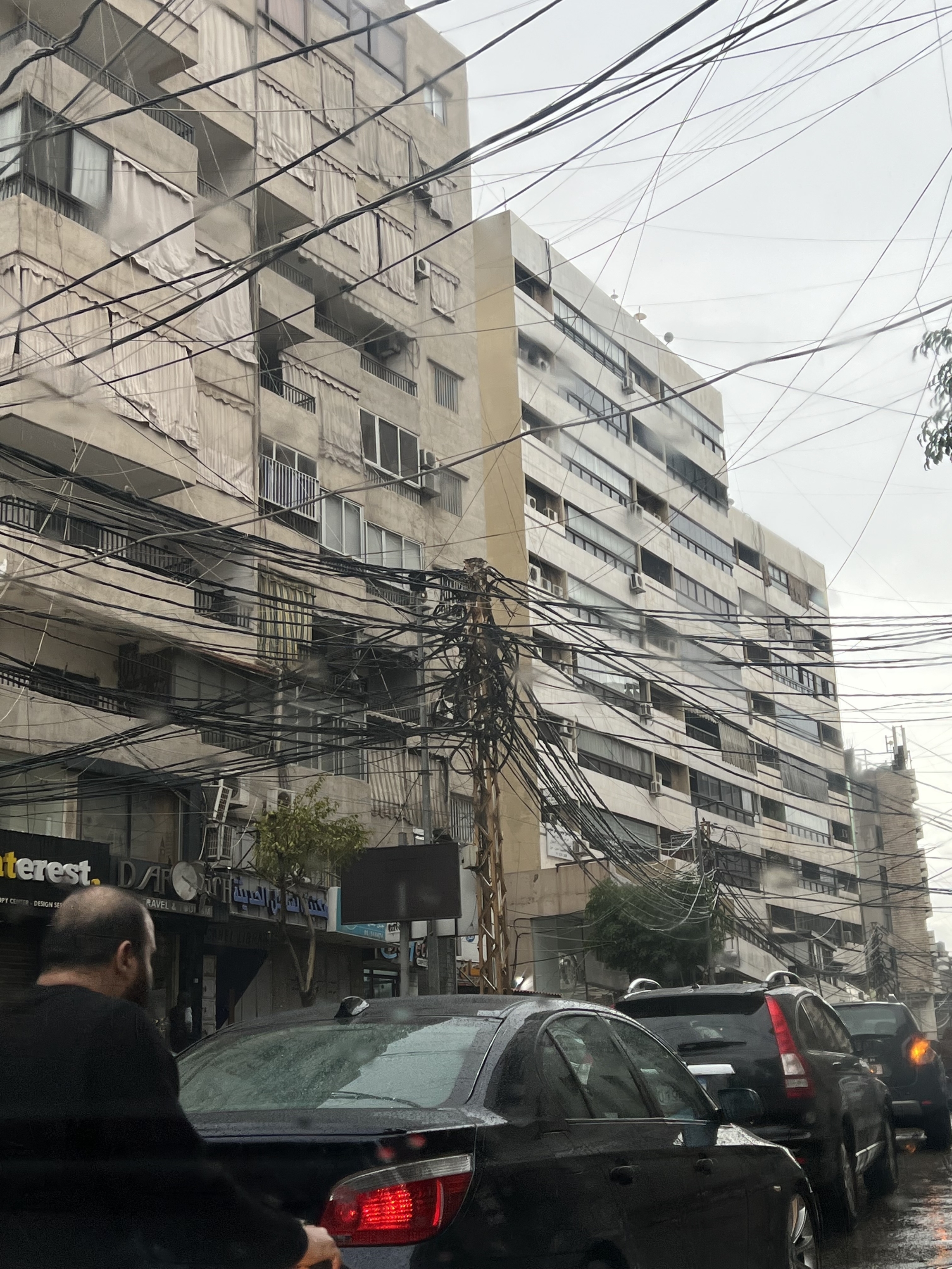 A web of electric cables runs through a neighborhood in Beirut. Government-provider electricity is only available for only a few hours a day. A web of electric cables runs through a neighborhood in Beirut. Government-provider electricity is only available for only a few hours a day.