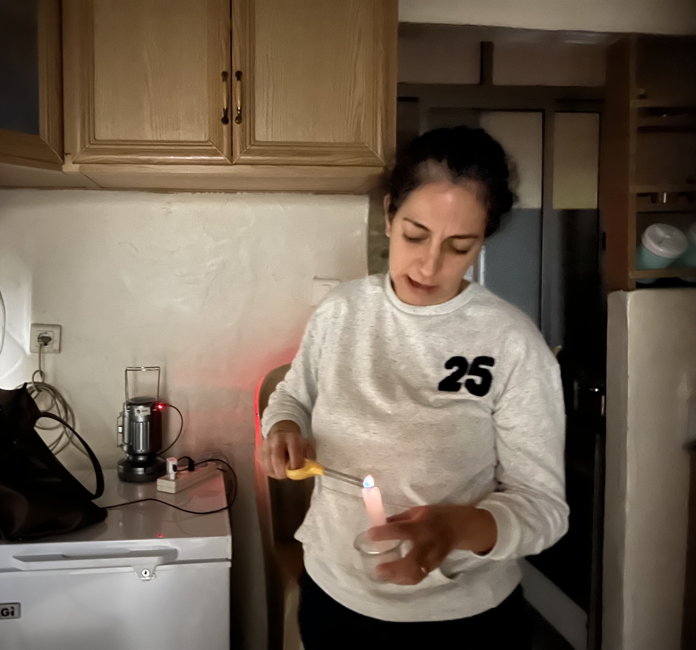 Diala Attieh Younes in Beirut has become much more reliant on candles for light as her family's power bills have skyrocketed. Diala Attieh Younes in Beirut has become much more reliant on candles for light as her family's power bills have skyrocketed.