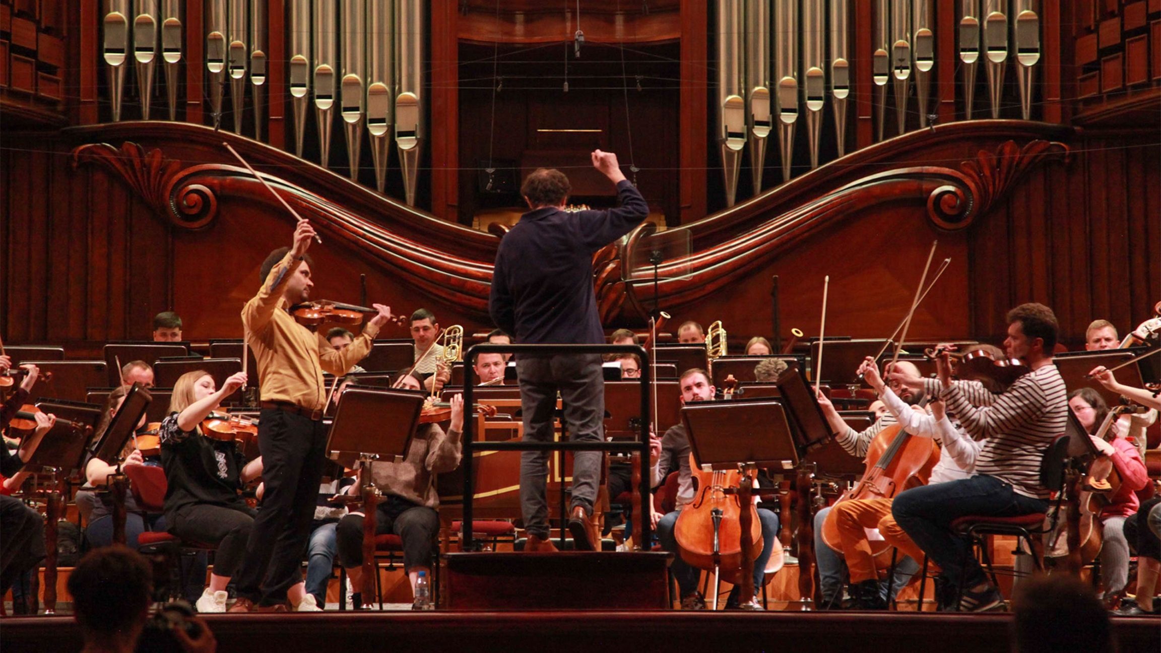 The Kyiv Symphony Orchestra rehearses at the National Philharmonic in Warsaw, Poland, the day before the premiere performance of the 