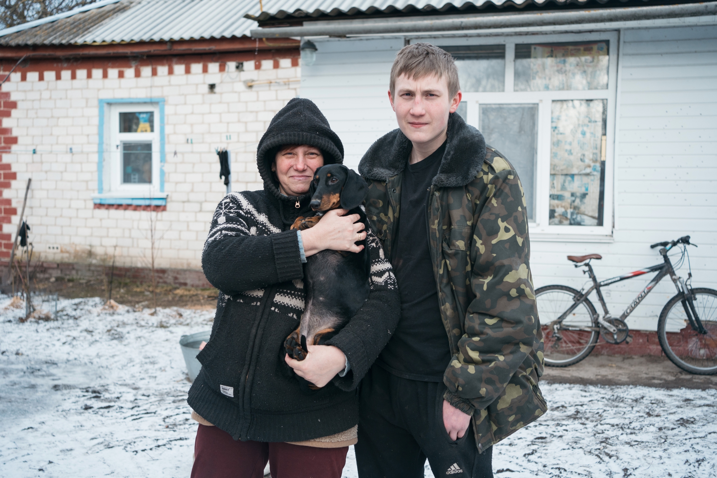 woman, son and dog