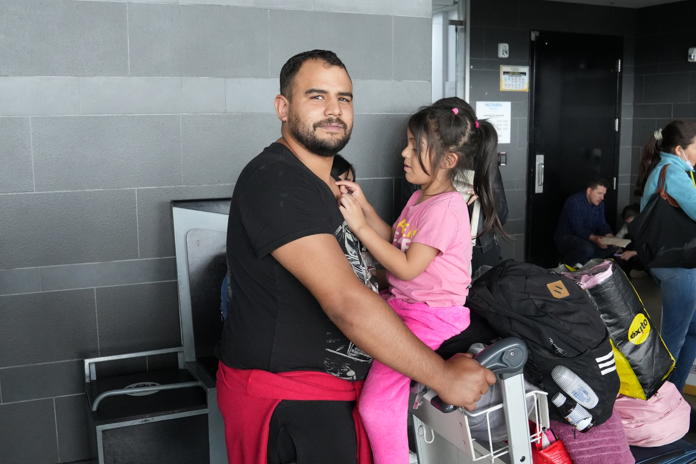 man holding daughter