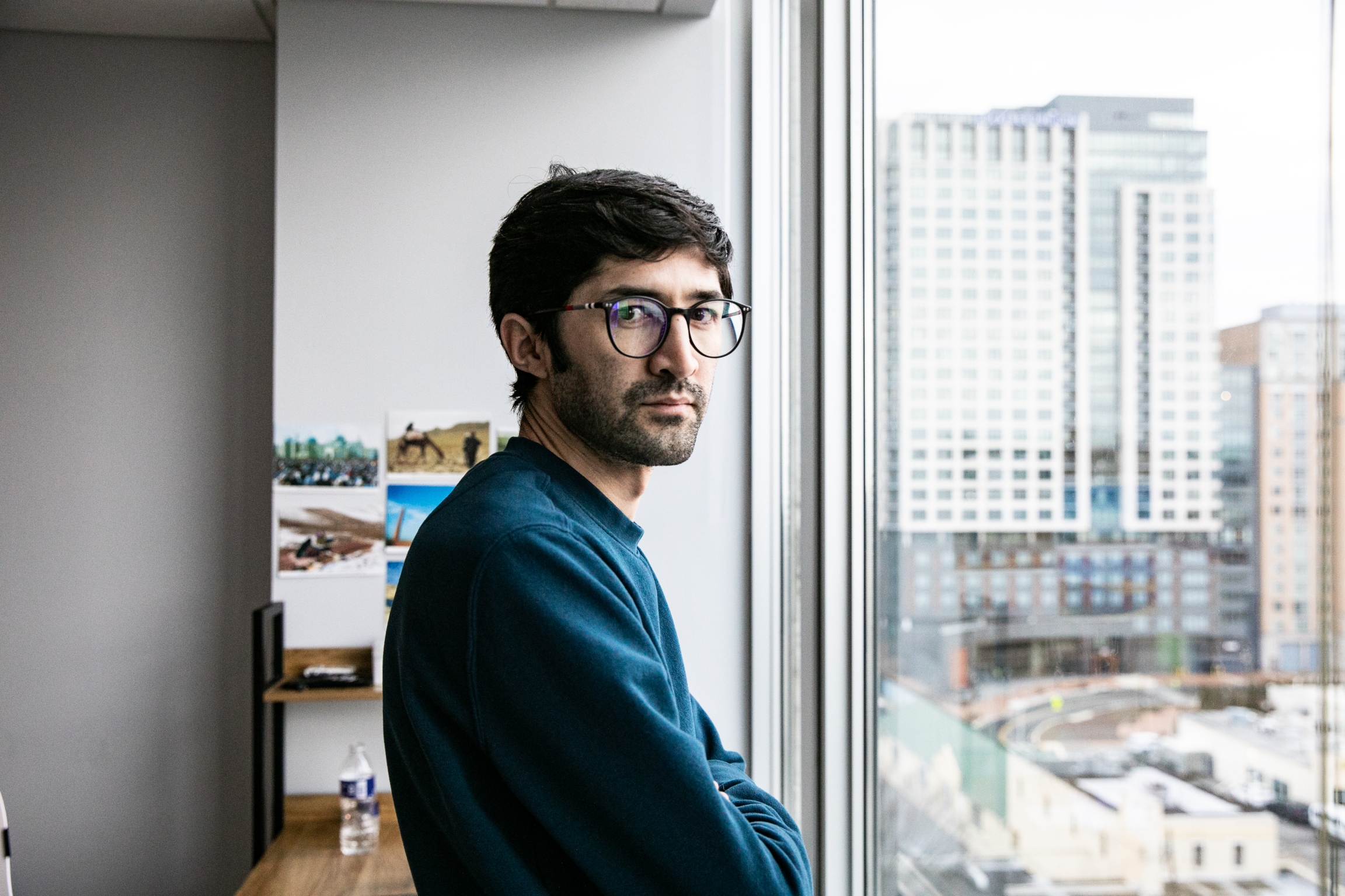 man near window