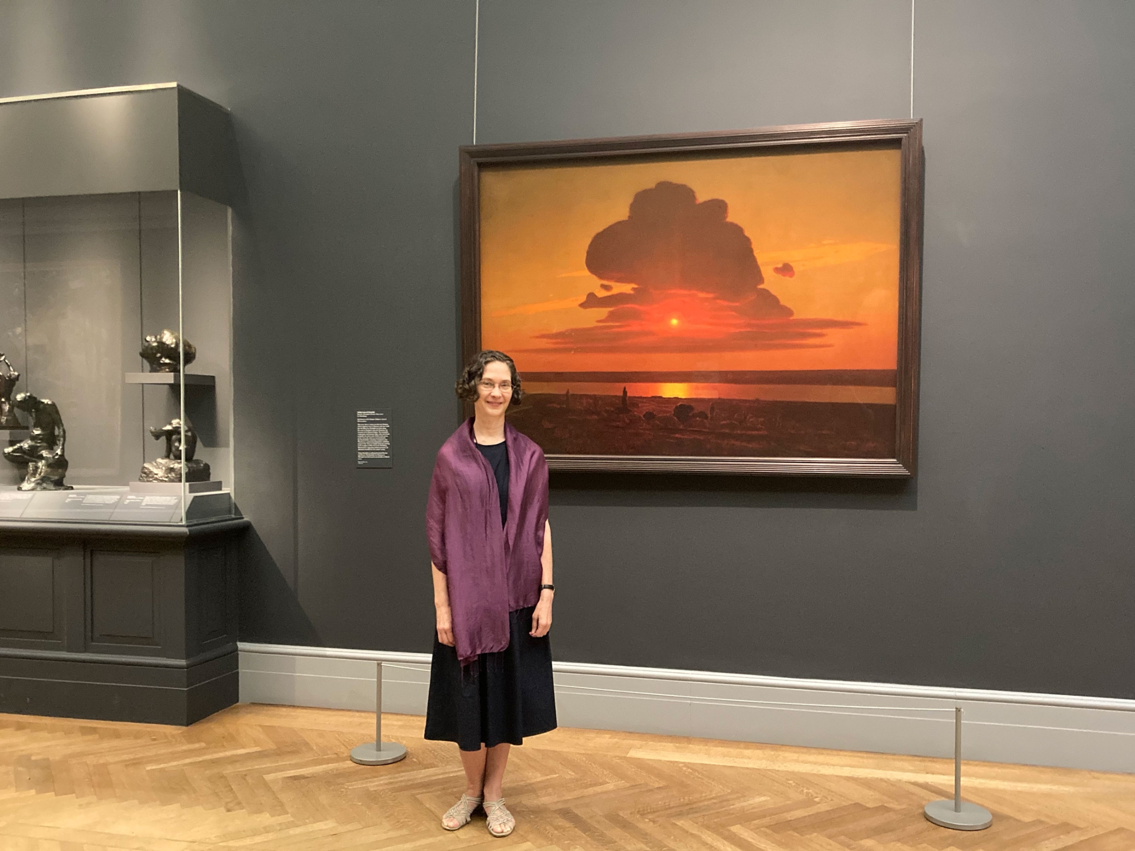Margaret Samu, art historian and lecturer, stands near 