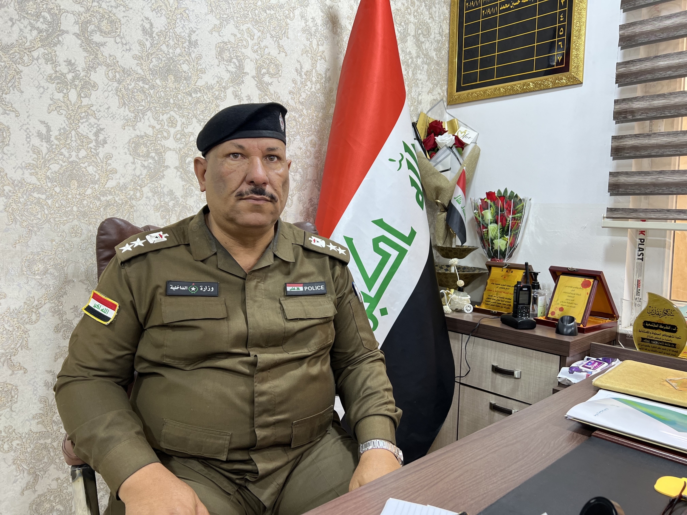 officer near flag 