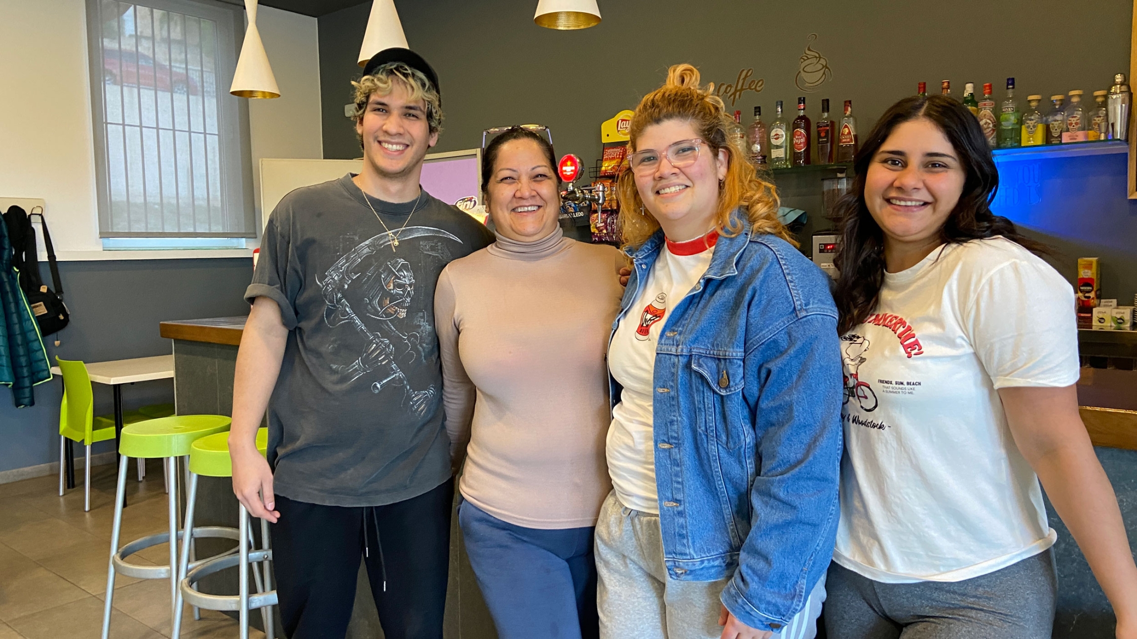 Marlí Mora, second from right, owns and runs Lledó’s only bar. 