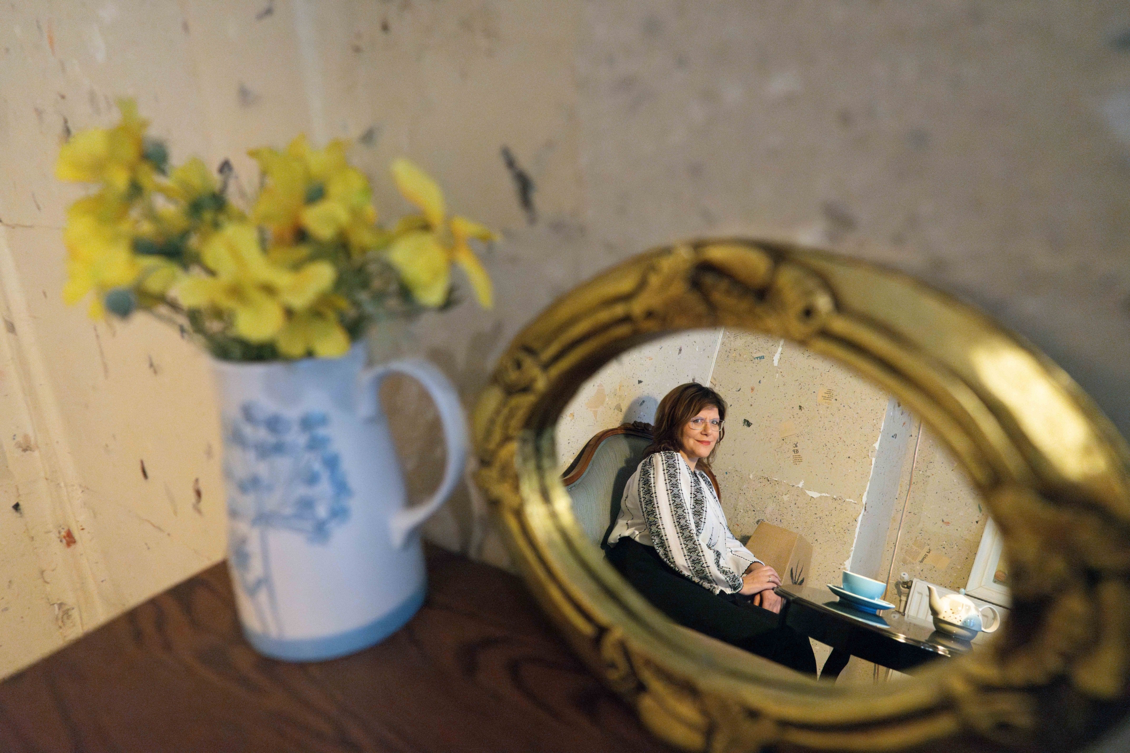 mirror with woman in reflection