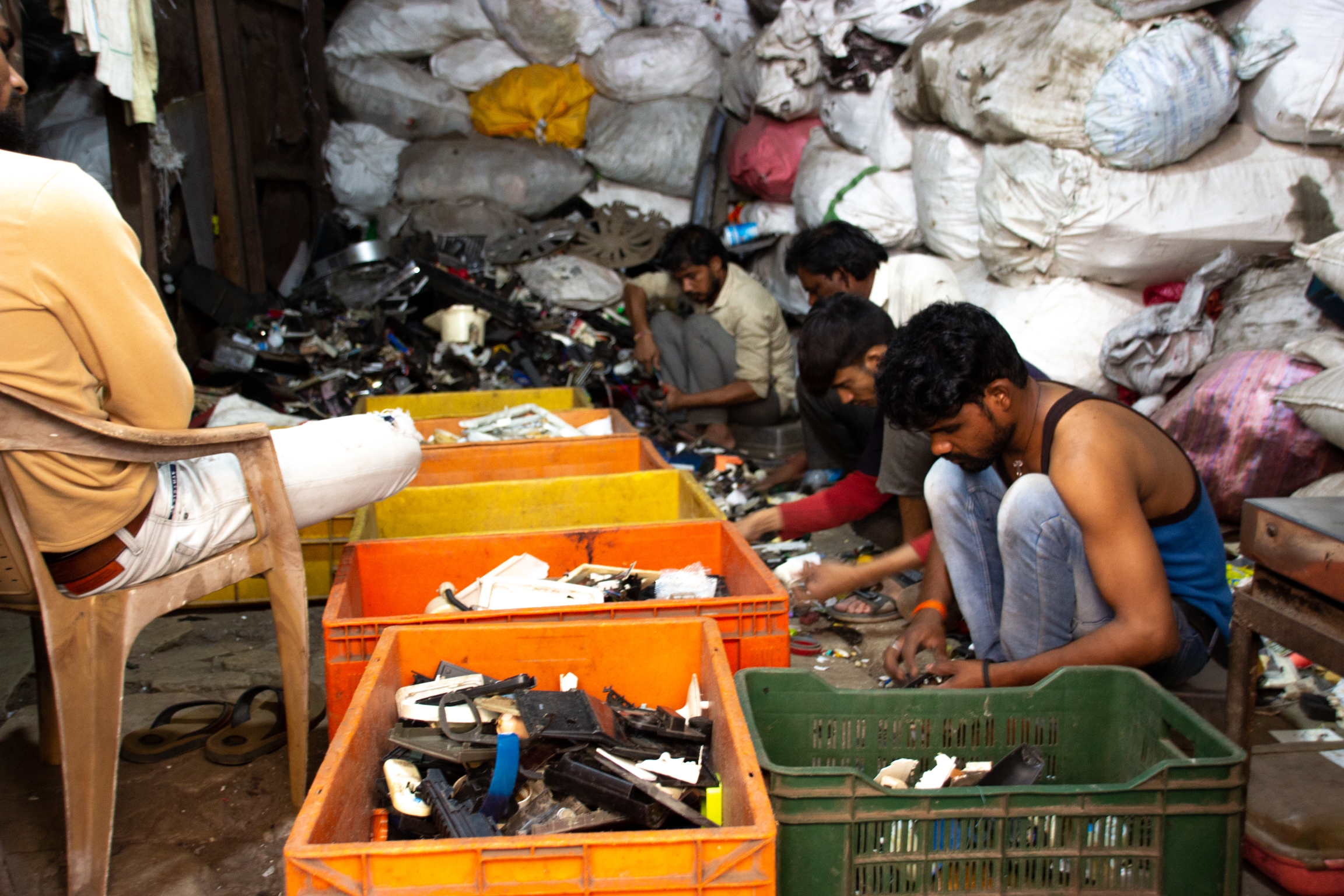 men at bins 