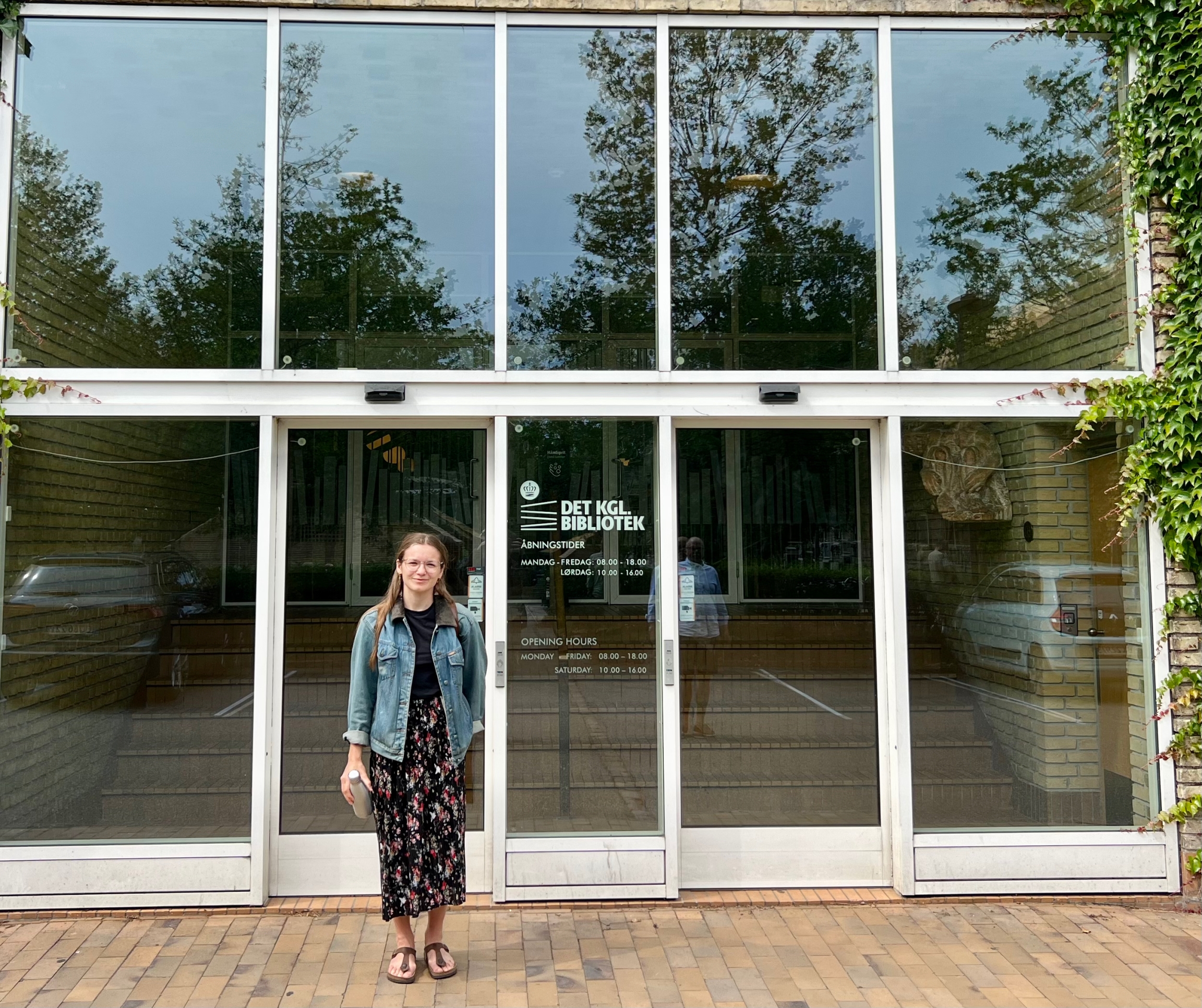 woman in front of building
