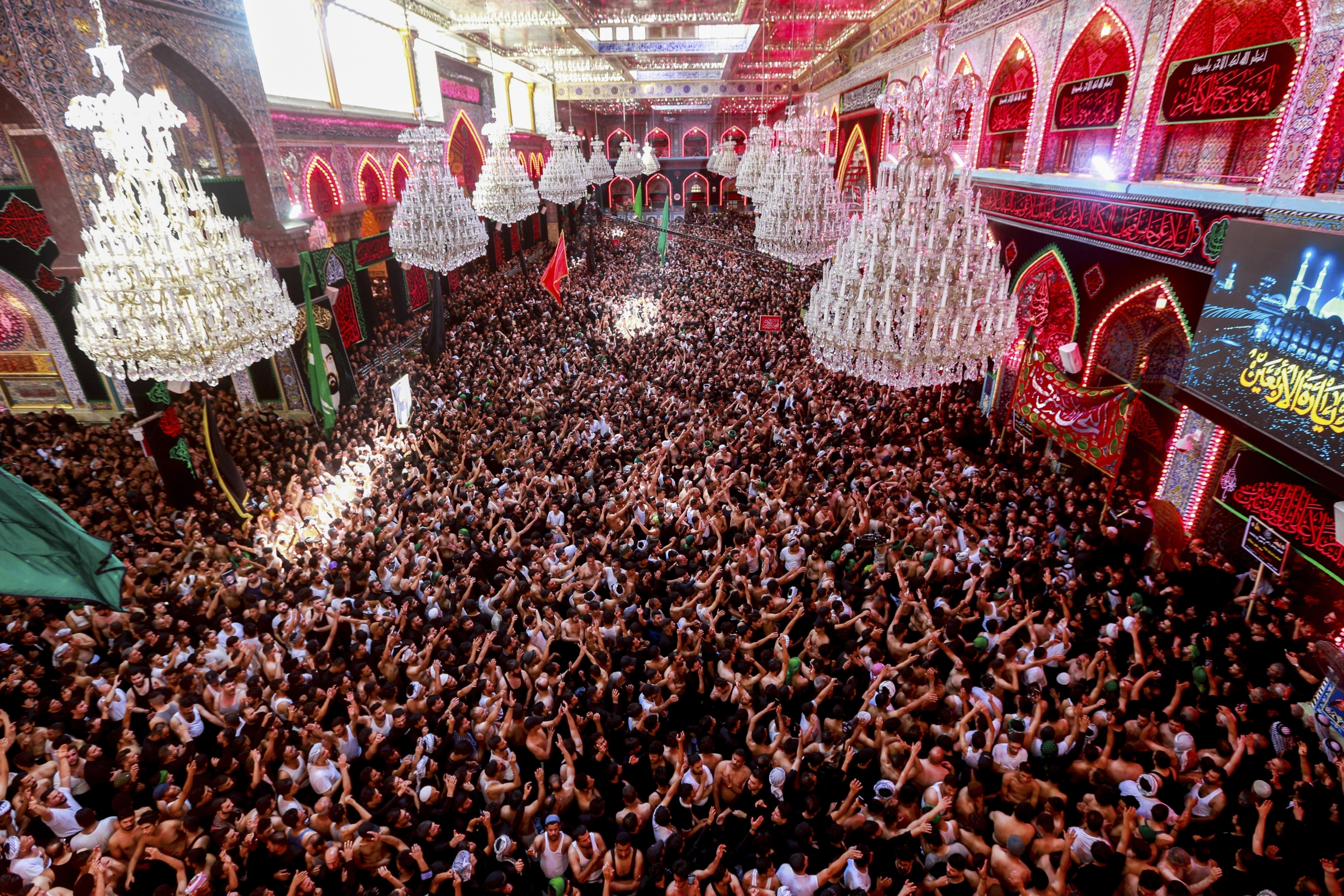 People mark Arbaeen in Karbala, Iraq, Sept. 6, 2023.