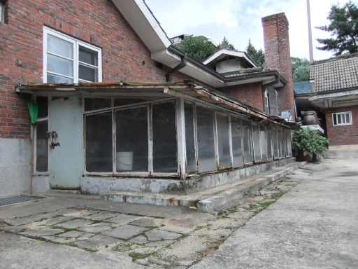A dilapidated brick building
