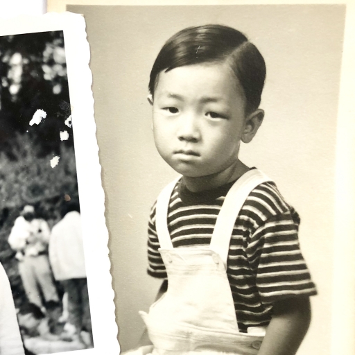 An old photo of a child posing for the camera