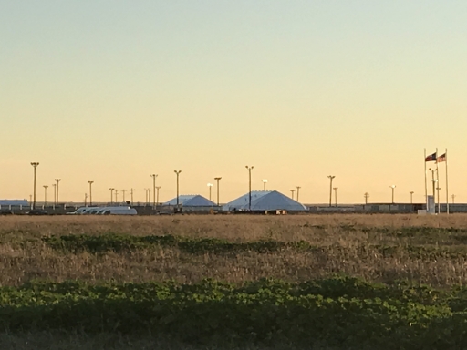 A detention compound in the distance