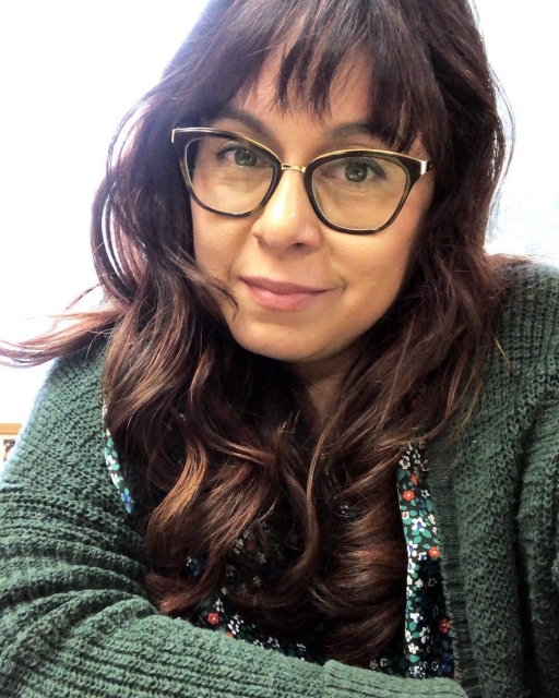 A woman looking at the camera.