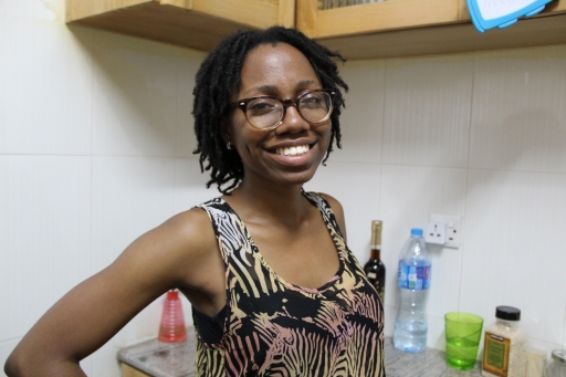 Woman with glasses smiles