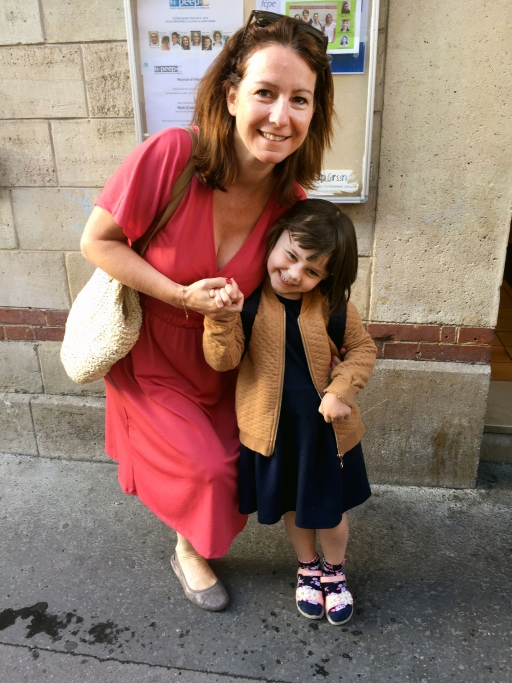 Isabelle Laurans poses with her daughter, Charlotte. Laurans had to leave France for IVF treatment in Belgium to get pregnant with her daughter. A woman poses for a photo with a young girl, her daughter