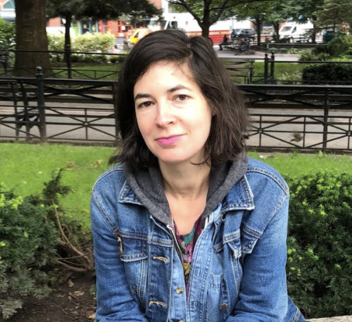 Elana Gordon A woman with a jean jacket posses for a photo.
