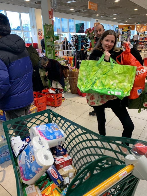 A young woman at a grocery store