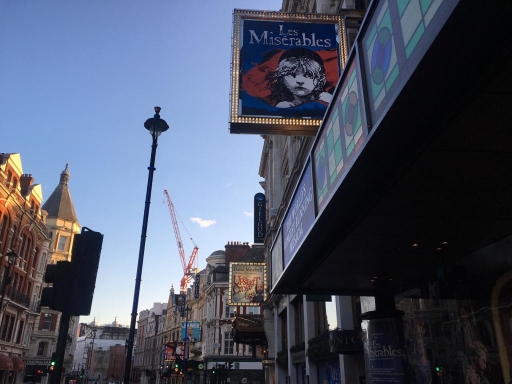 On Shaftesbury Avenue in the West End, four theaters stand alongside each other and decided to keep their lights on despite their closures due to COVID-19. On one street, four theater signs continue to light up.