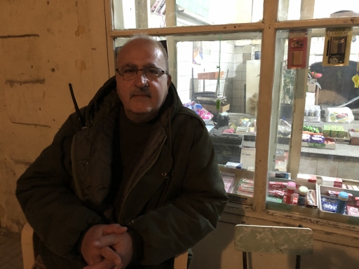 Baruyr Solakian sits outside a shop in Beirut's Bourj al-Hammoud neighborhood. Baruyr Solakian sits outside a shop in Beirut's Bourj al-Hammoud neighborhood.
