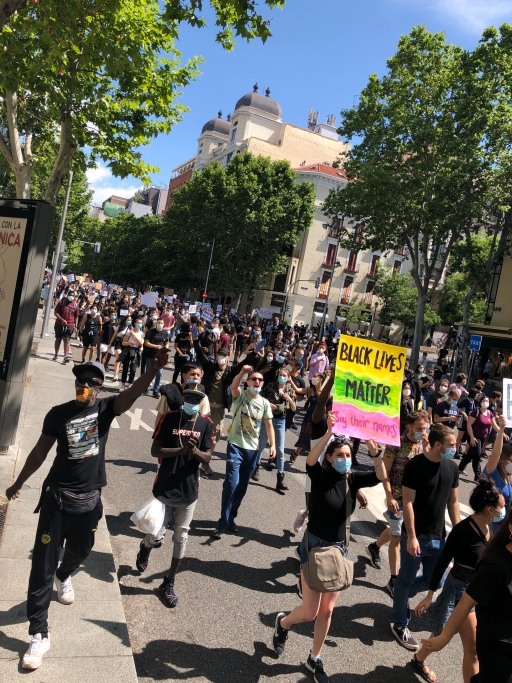 Protesters marched on June 7 in Madrid, Spain, holding signs with anti-racist slogans. Protesters marched on June 7 in Madrid, Spain, holding signs with anti-racist slogans.