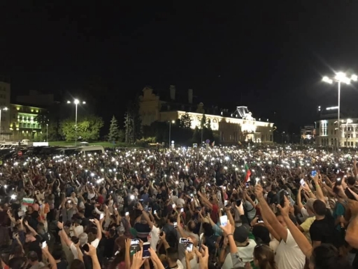 Protesters have gathered in Sofia, Bulgaria, for over two months, demanding the resignation of Prime Minister Boyko Borisov and chief prosecutor, Ivan Geshev. Mass crowds hold lights in a protest outside in Sofia, Bulgaria